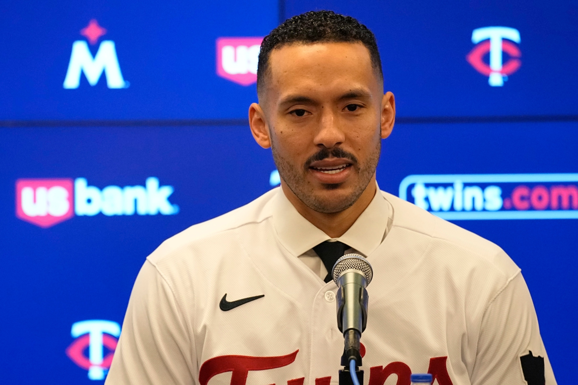 Minnesota Twins Carlos Correa speaks to the media during a baseball press conference at Target Field Wednesday, Jan. 11, 2023