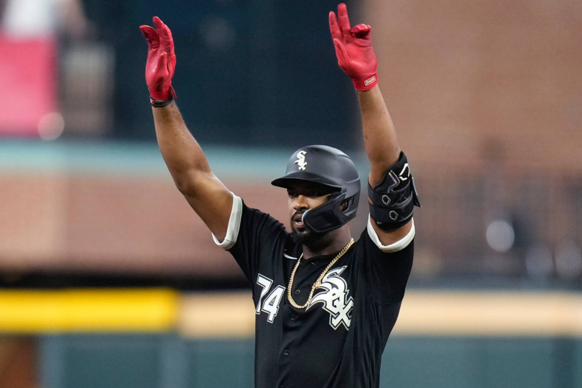 Chicago White Soxs Eloy Jimenez reacts after his RBI double during the first inning of the teams baseball game against the Houston Astros