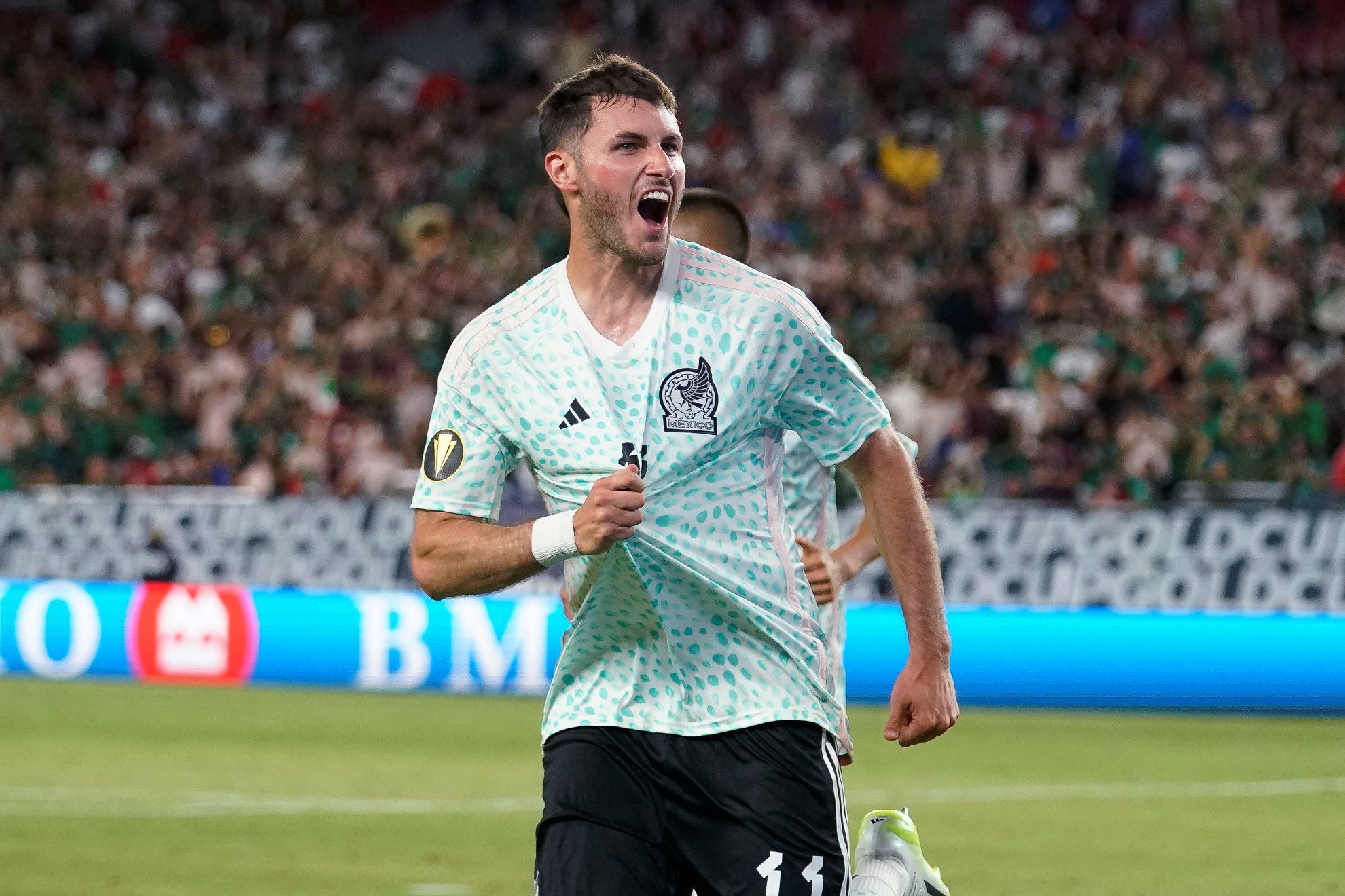 Mexicos Santiago Gimenez celebrates the teams third goal against Haiti.