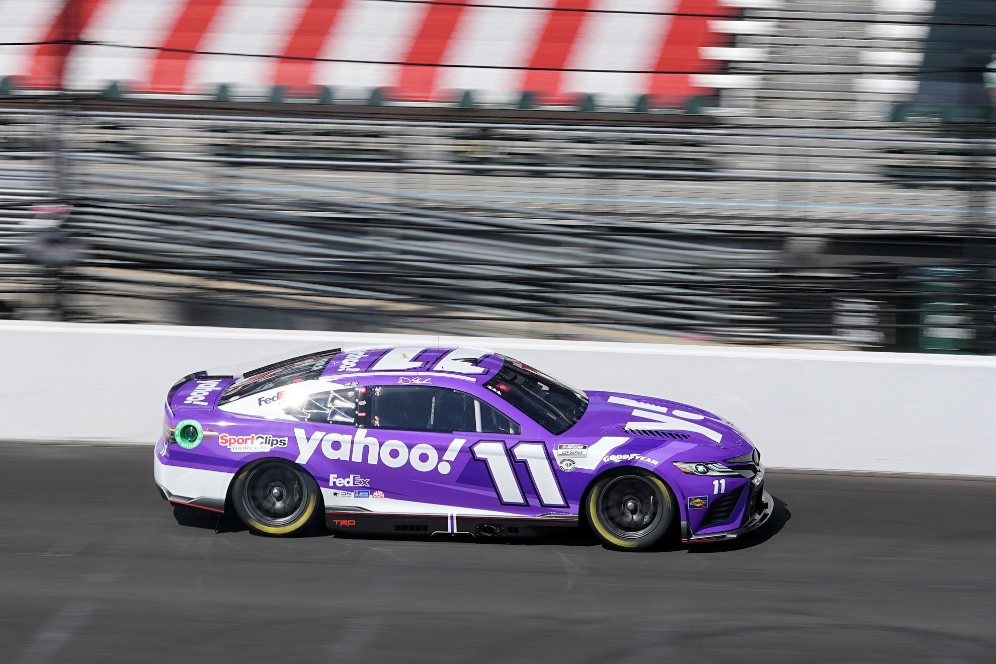 Denny Hamlin drives during a practice session for the NASCAR Cup Series auto race at Indianapolis Motor Speedway