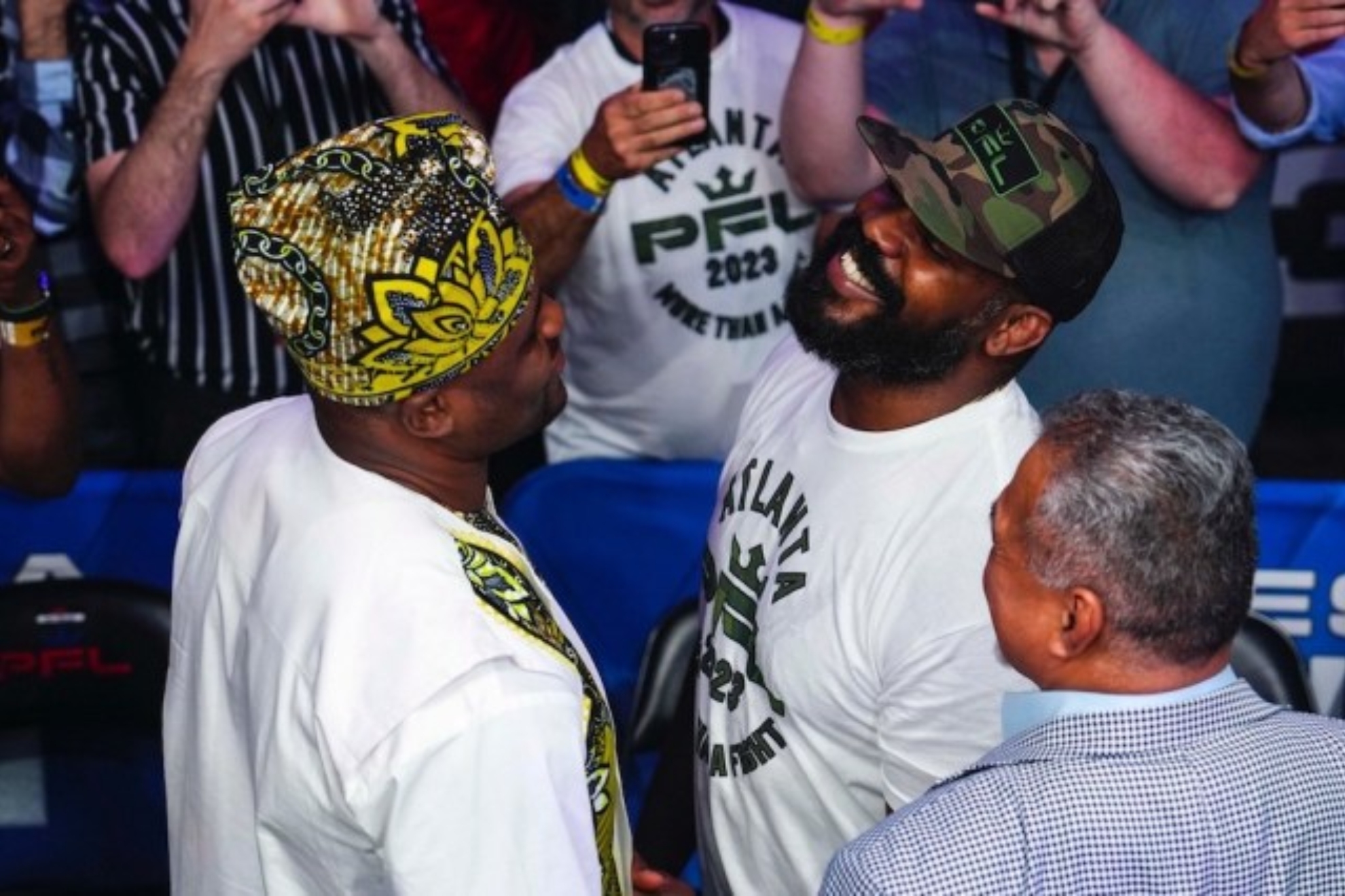 Francis Ngannou meets Jon Jones at a PFL event.