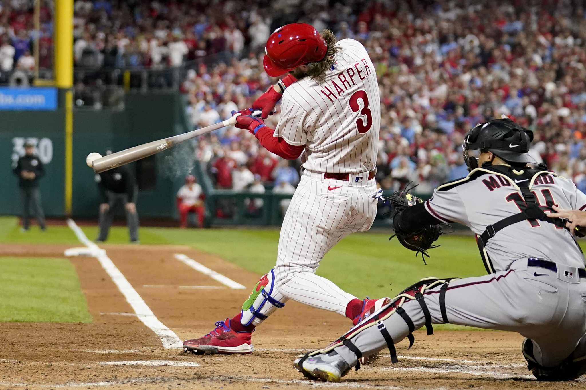 Philadelphia Phillies Bryce Harper hits a RBI-single against the Arizona Diamondbacks during the third inning in Game 1