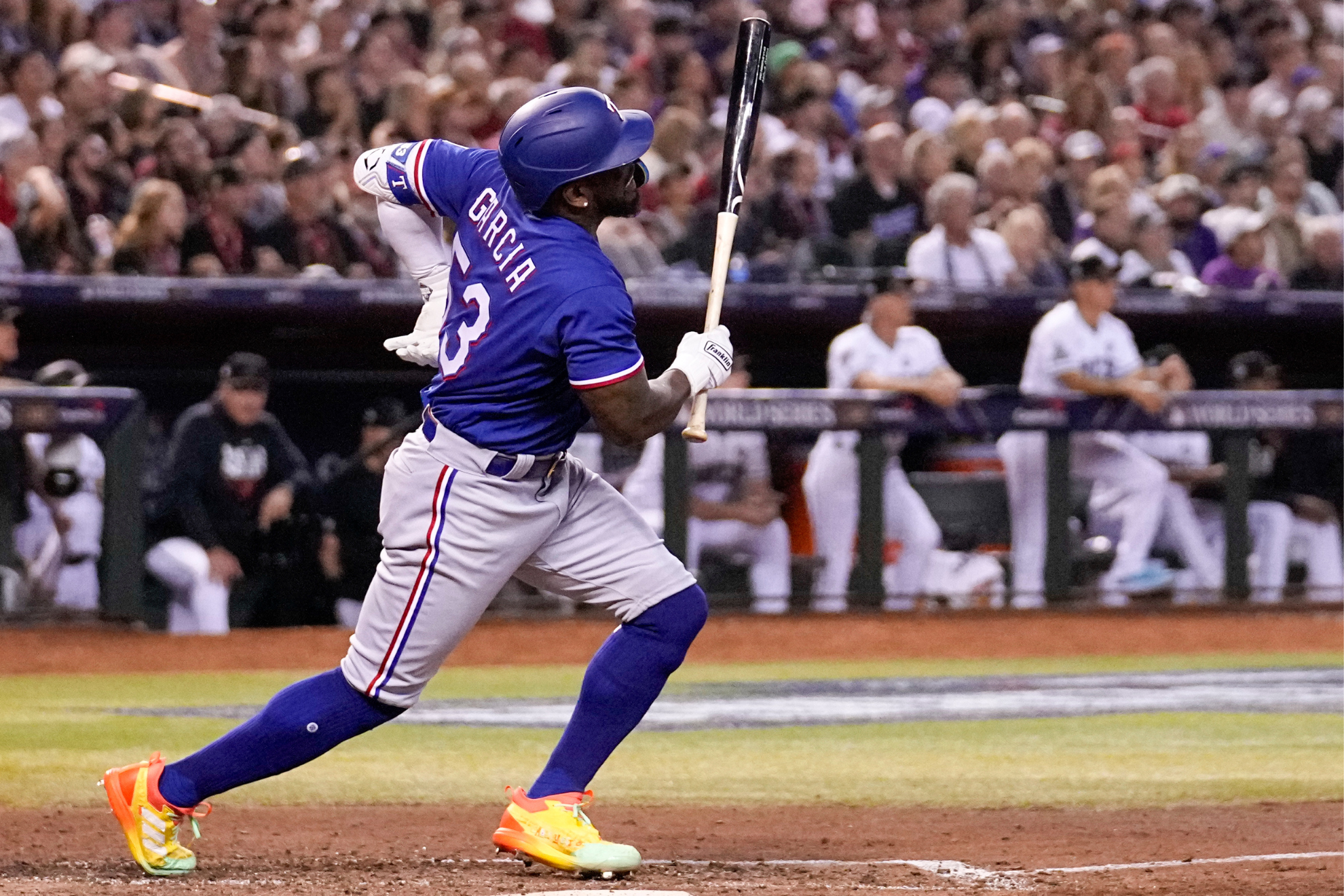 Garcia grabbing at his lower back in the eighth inning of Game 3.