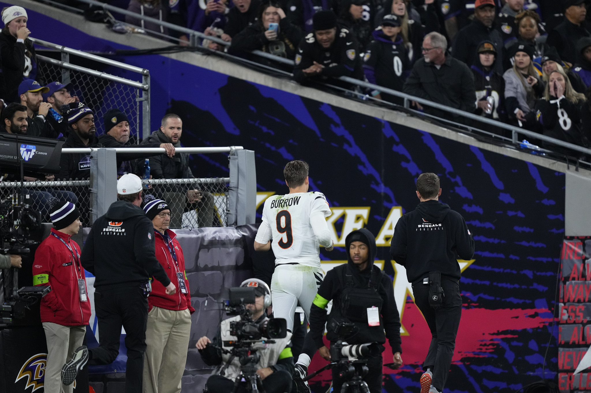 Cincinnati Bengals quarterback Joe Burrow (9) leaves the field in the first half of an NFL football game against the Baltimore Ravens.