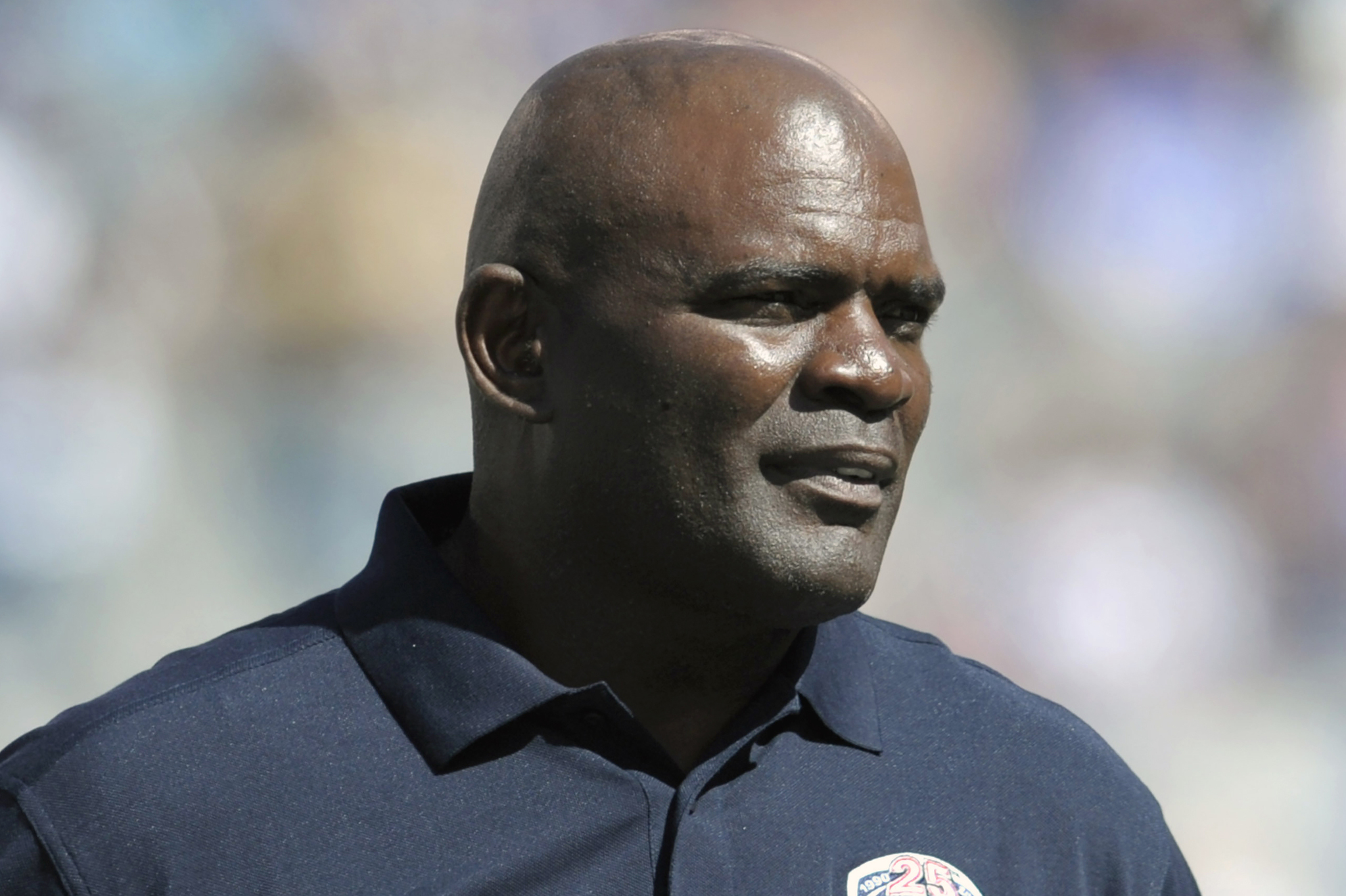 Former New York Giants Lawrence Taylor looks on during a 25 year anniversary celebration at halftime