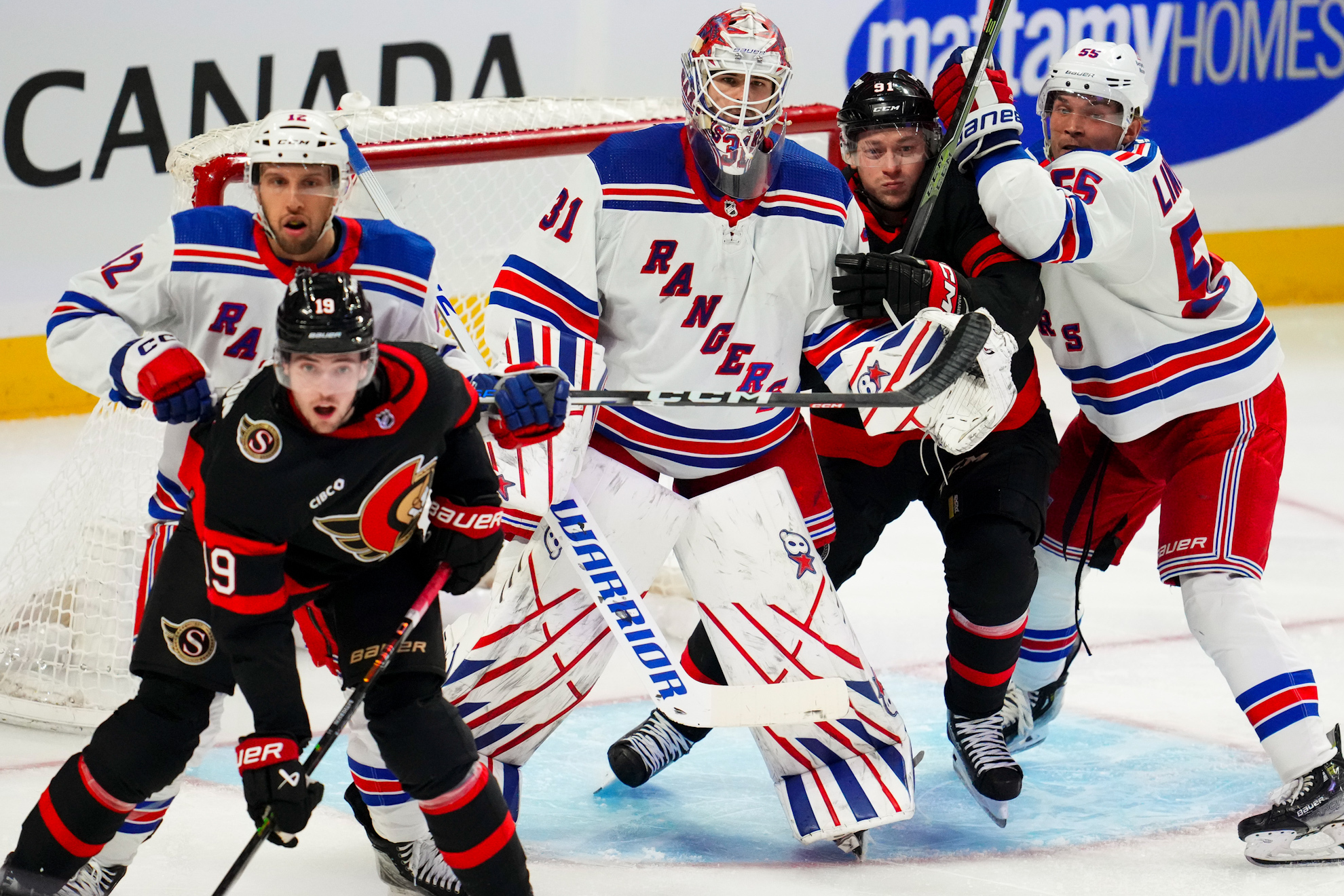 NHL player loses tooth after taking puck to the face