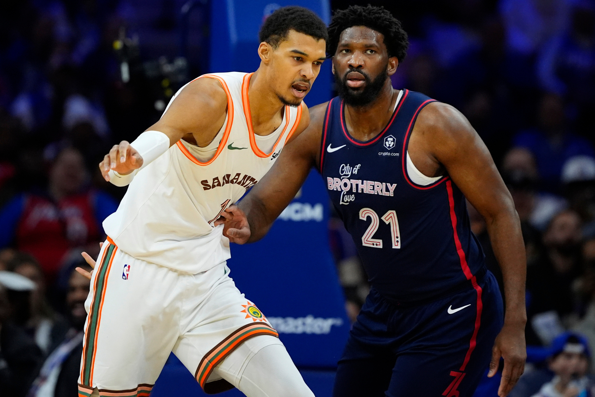 Wembanyama (left) scored 33 points, but Embiid (right) more than doubled that tally.