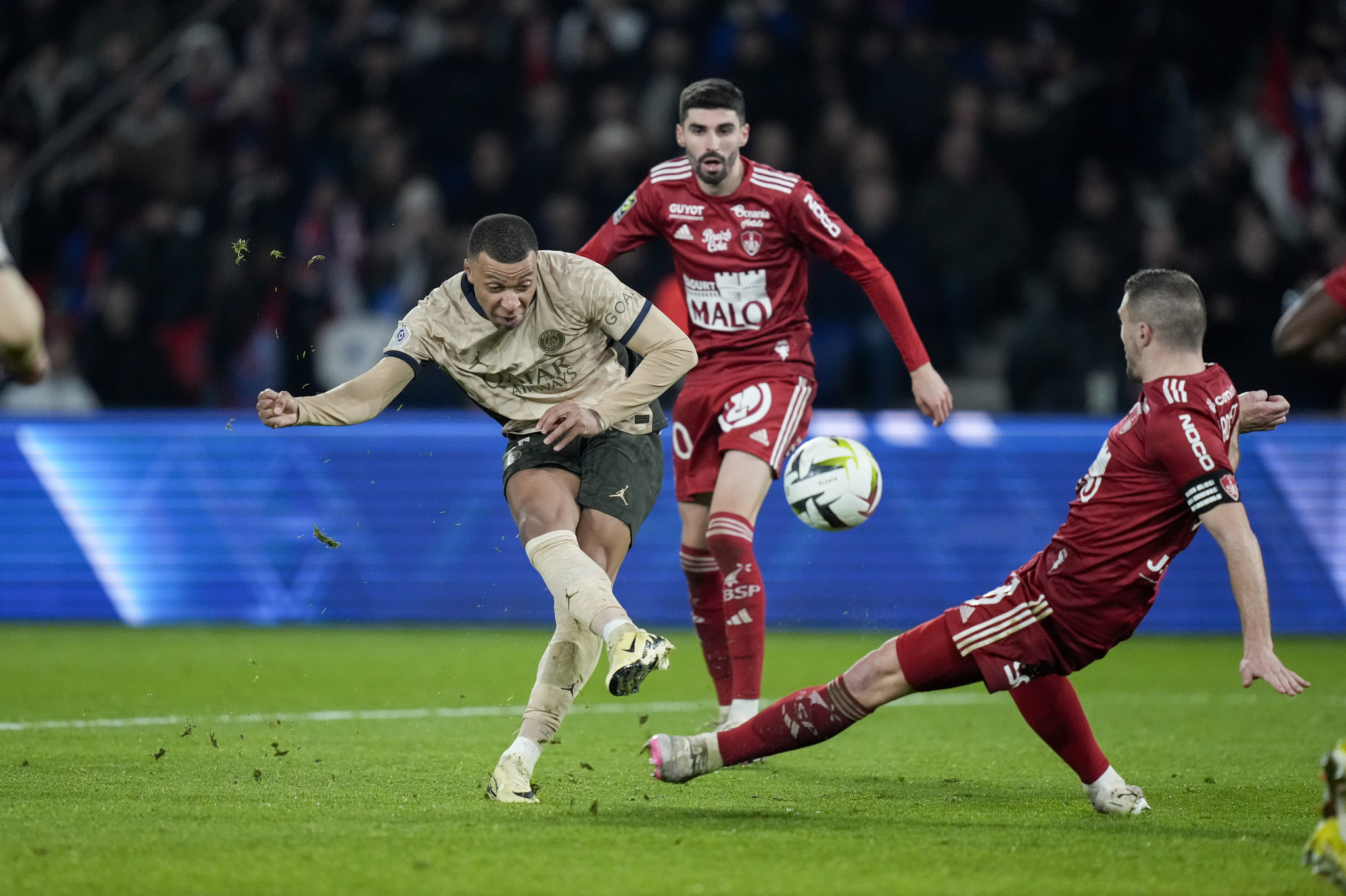 Kylian Mbappe attempts a shot on goal