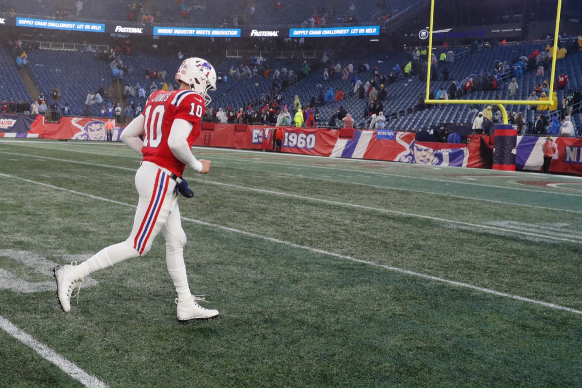 Mac Jones heads to the locker room after a 6-0 loss to the Chargers on Dec. 3, 2023.