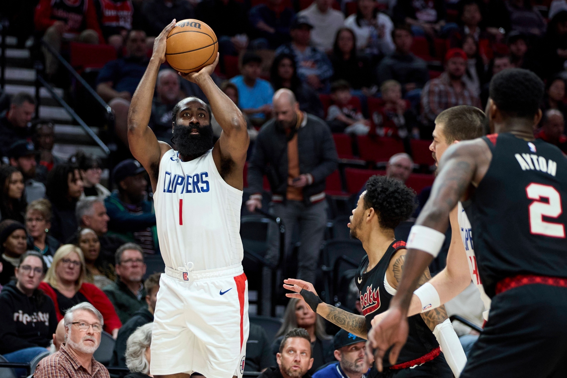 James Harden attempts a shot vs Trail Blazers