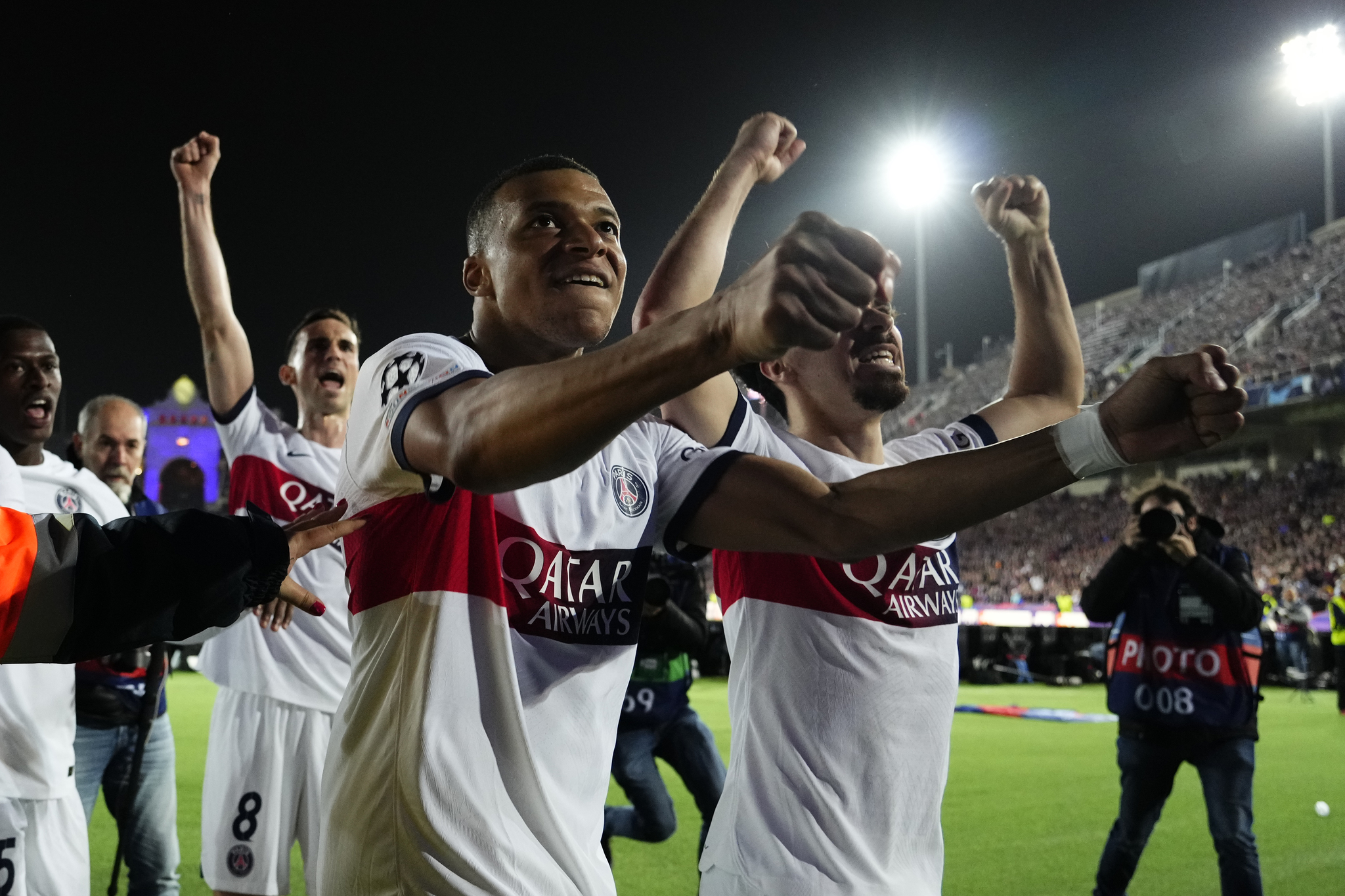 Kylian Mbappe celebrates after his two goals helped PSG take down Barcelona