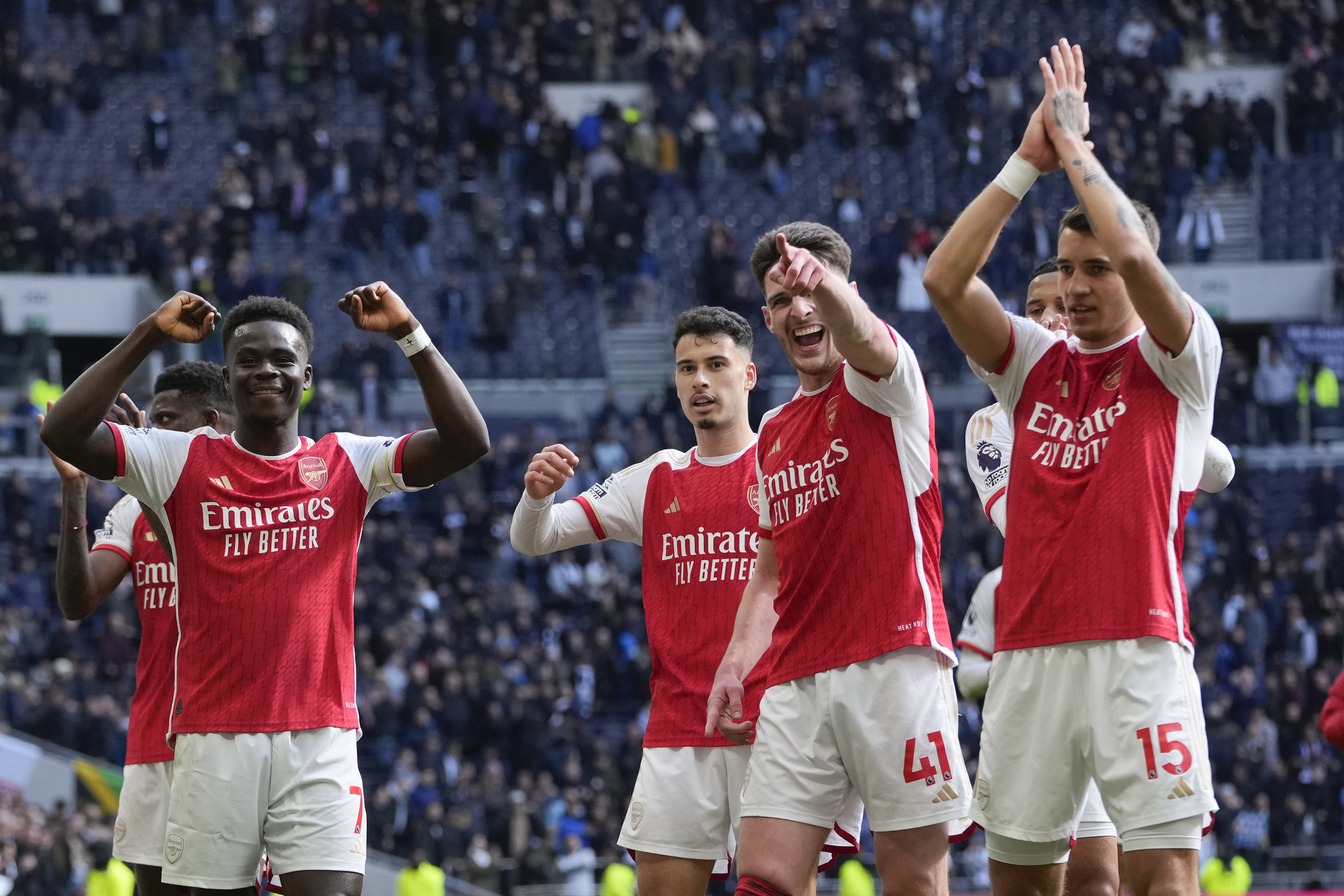 Arsenal players after their win at Tottenham