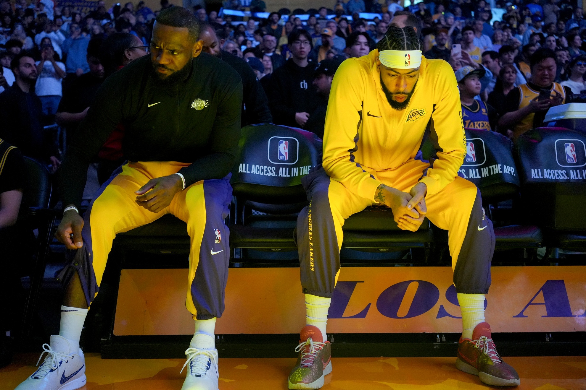 LeBron James sitting next to Anthony Davis