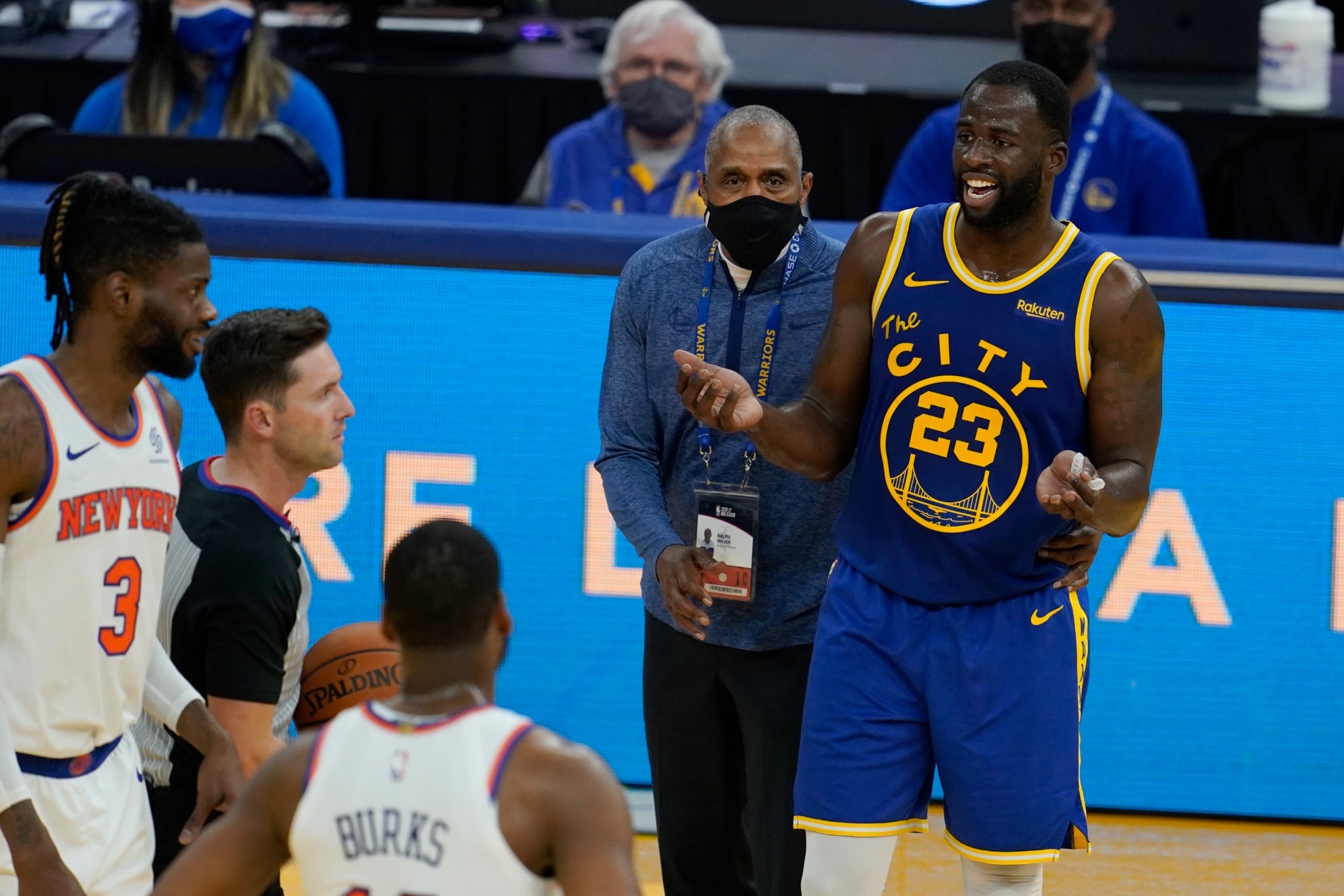 Golden State Warriors forward Draymond Green (23) reacts to a technical foul next to security guard Ralph Walker against the New York Knicks during an NBA basketball game in San Francisco, Thursday, Jan. 21, 2021. (AP Photo/Jeff Chiu)