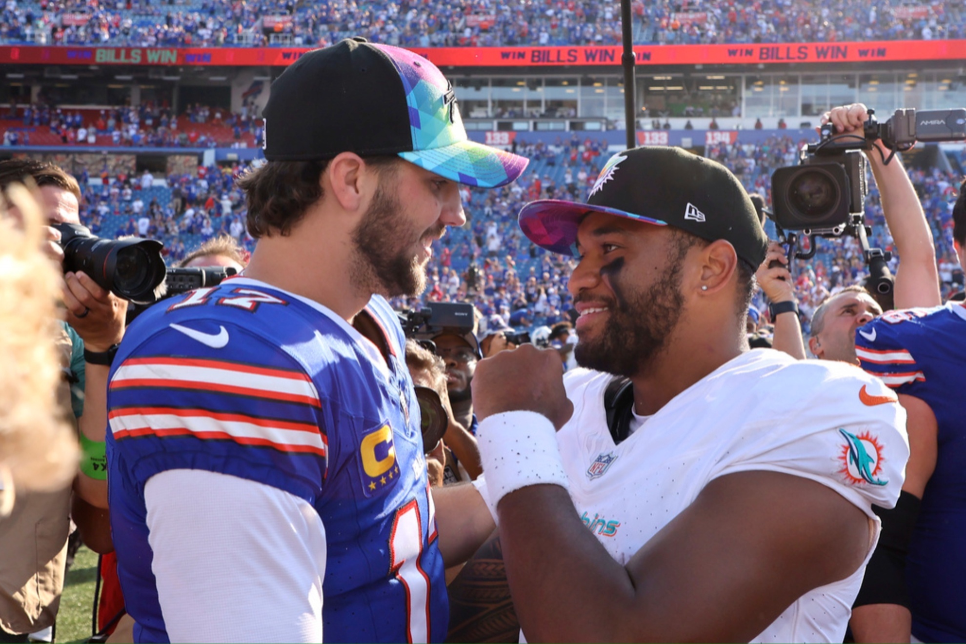 Tua Tagovailoa (R) and Josh Allen will clash again in the first 2024 TNF.