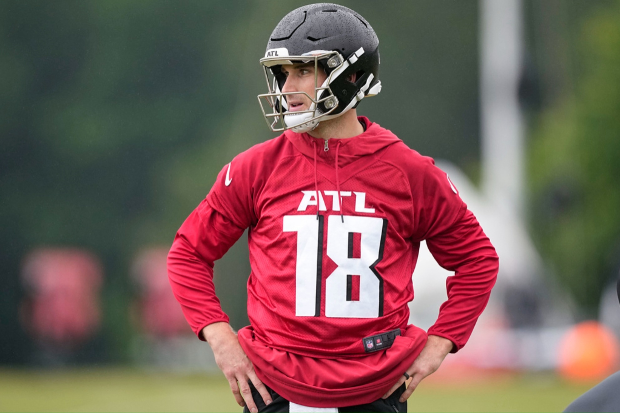 Kirk Cousins runs drills during a mini training camp practice on Tuesday, May 14.