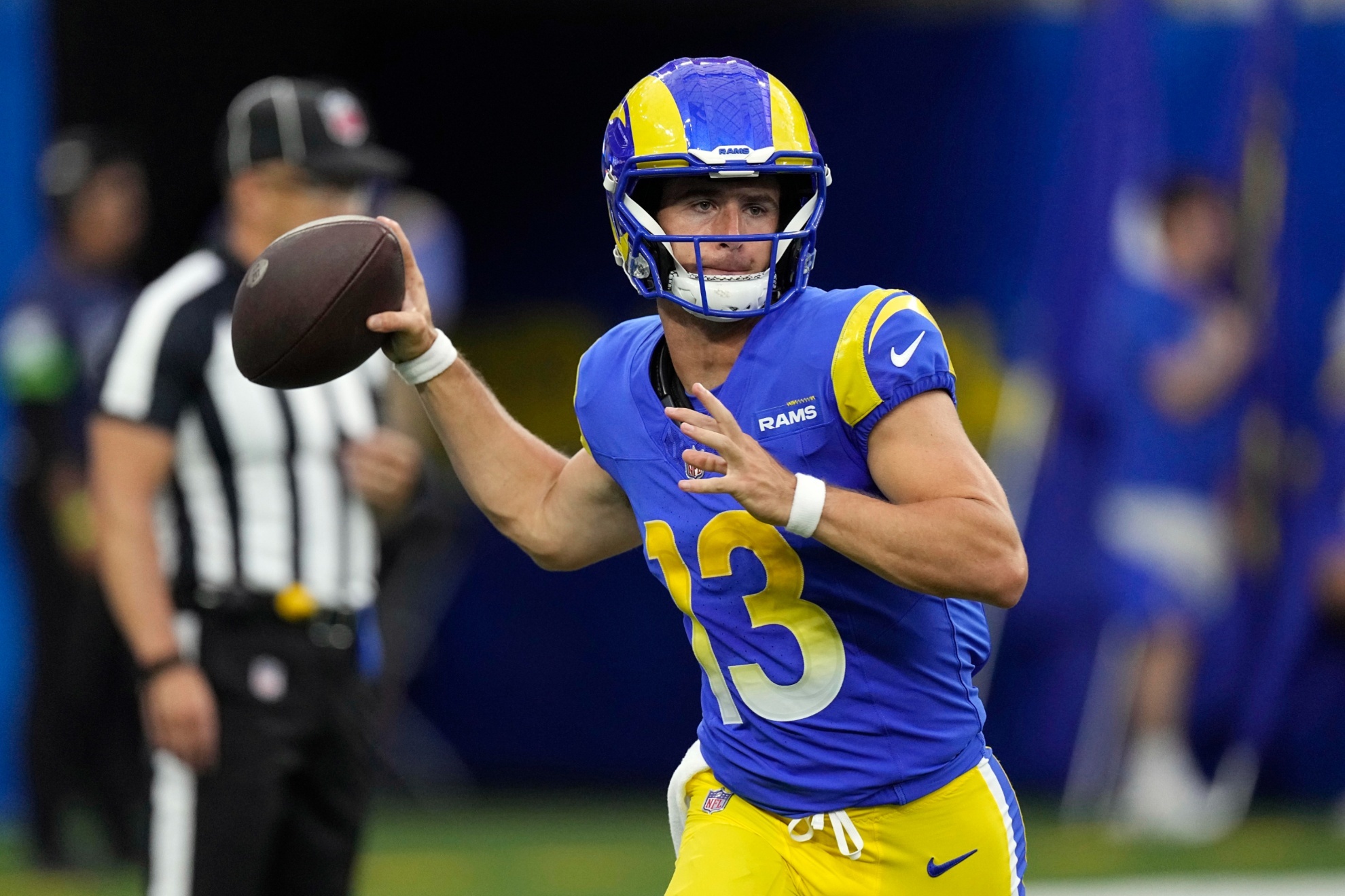 Los Angeles Rams quarterback Stetson Bennett throws during the first half of a preseason NFL football game against the Las Vegas Raiders Saturday, Aug. 19, 2023, in Inglewood, Calif. Quarterback Stetson Bennett has rejoined the Los Angeles Rams for the start of their offseason program after missing his entire rookie season for undisclosed reasons, Tuesday, April 23, 2024.(AP Photo/Mark J. Terrill, File)