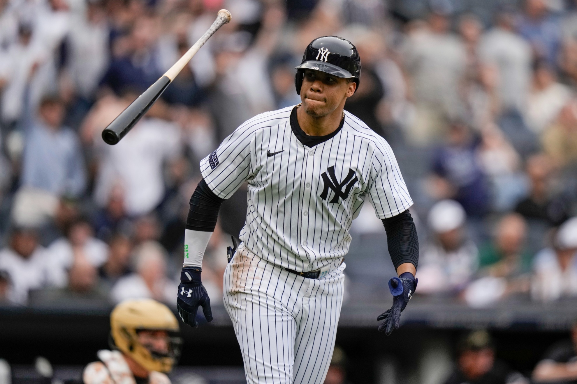 New York Yankees Juan Soto flips his bat after hitting a home run during the fifth inning of a baseball game against the Chicago White Sox, Saturday, May 18, 2024, in New York. The Yankees won 6-1. (AP Photo/Frank Franklin II)