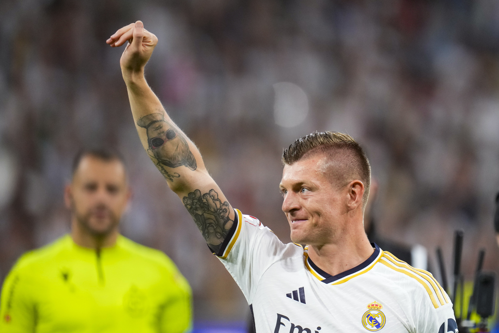 Toni Kroos gestures to the fans