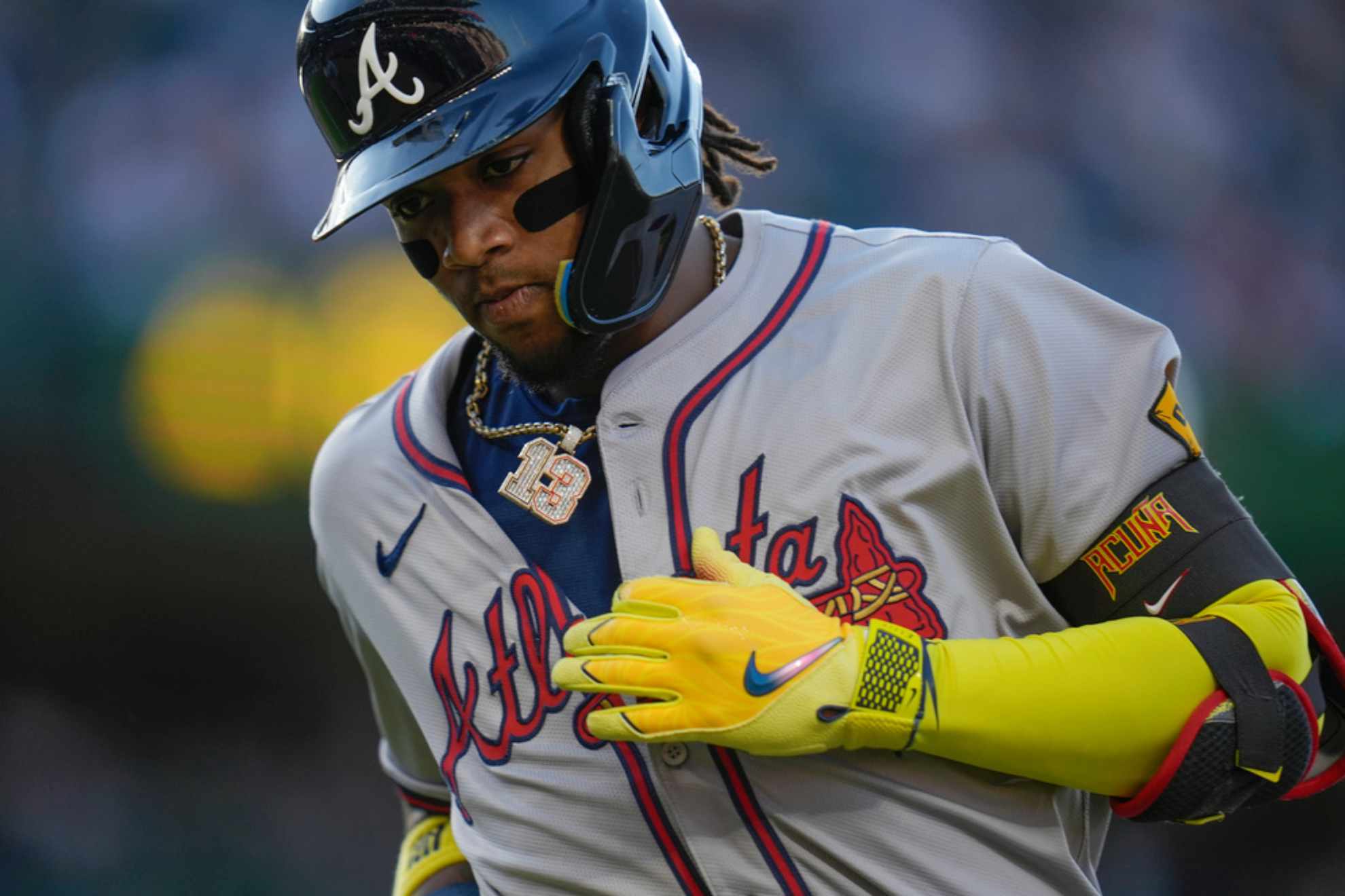 Atlanta Braves Ronald Acu�a Jr. jogs to the dugout /