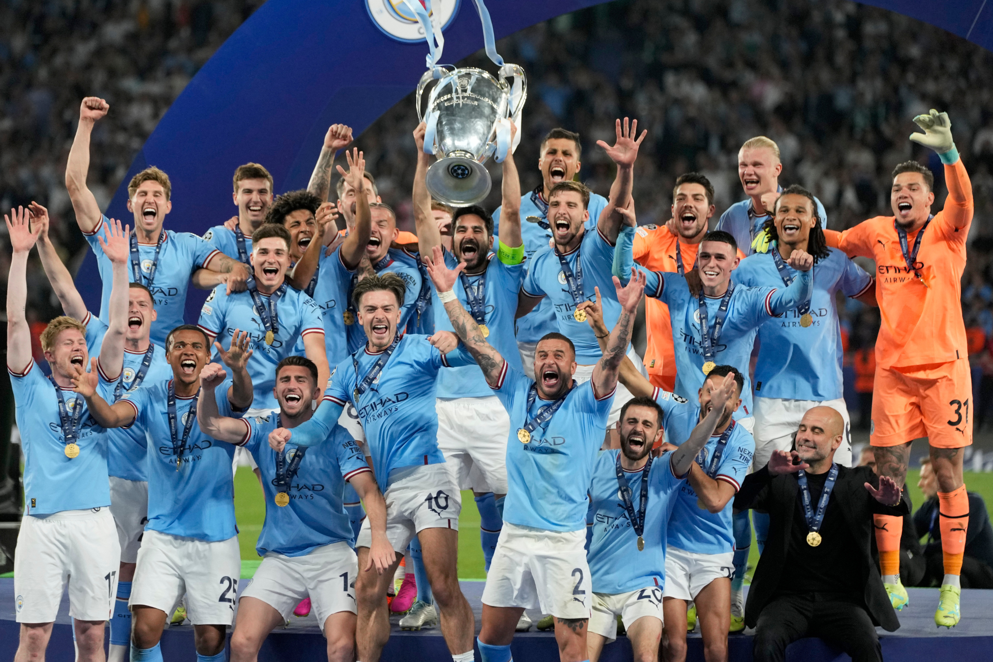 G�ndogan lits the Champions League trophy with Man City last season