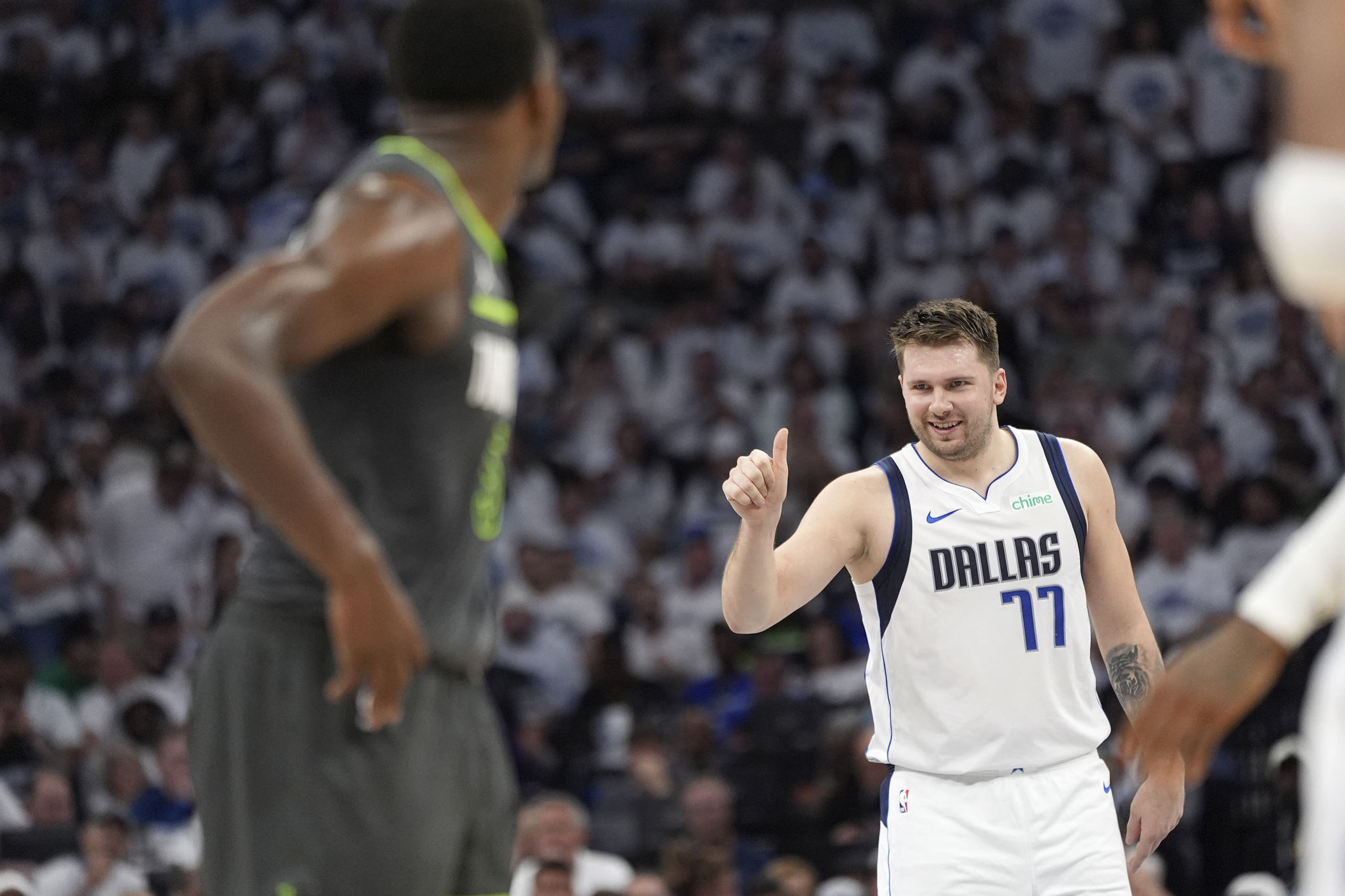 Dallas Mavericks guard Luka Doncic (77) celebrates his score vs Minnesota Timberwolves