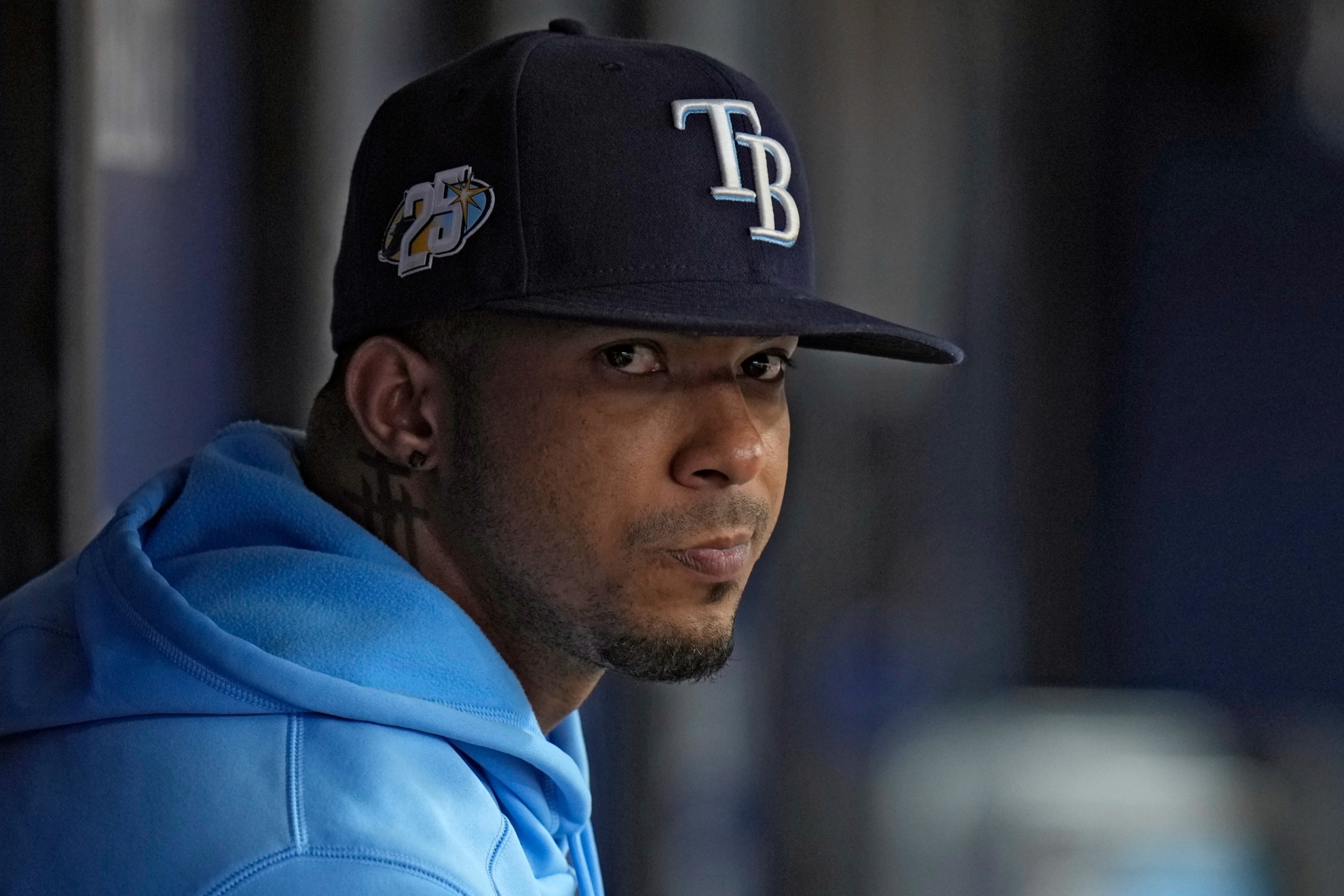 Tampa Bay Rays shortstop Wander Franco watches from the dugout during the fifth inning of a baseball game against the Cleveland Guardians Sunday, Aug. 13, 2023, in St. Petersburg, Fla. (AP Photo/Chris OMeara)