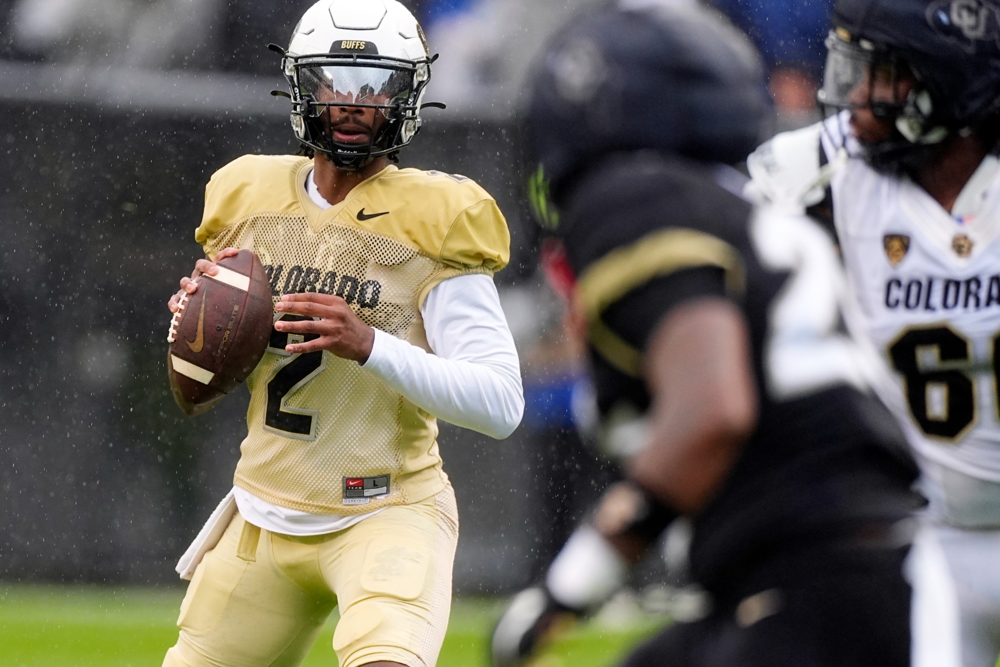 Colorado quarterback Shedeur Sanders drops back to pass during the first half of the teams spring NCAA college football game Saturday, April 27, 2024, in Boulder, Colo. (AP Photo/David Zalubowski)