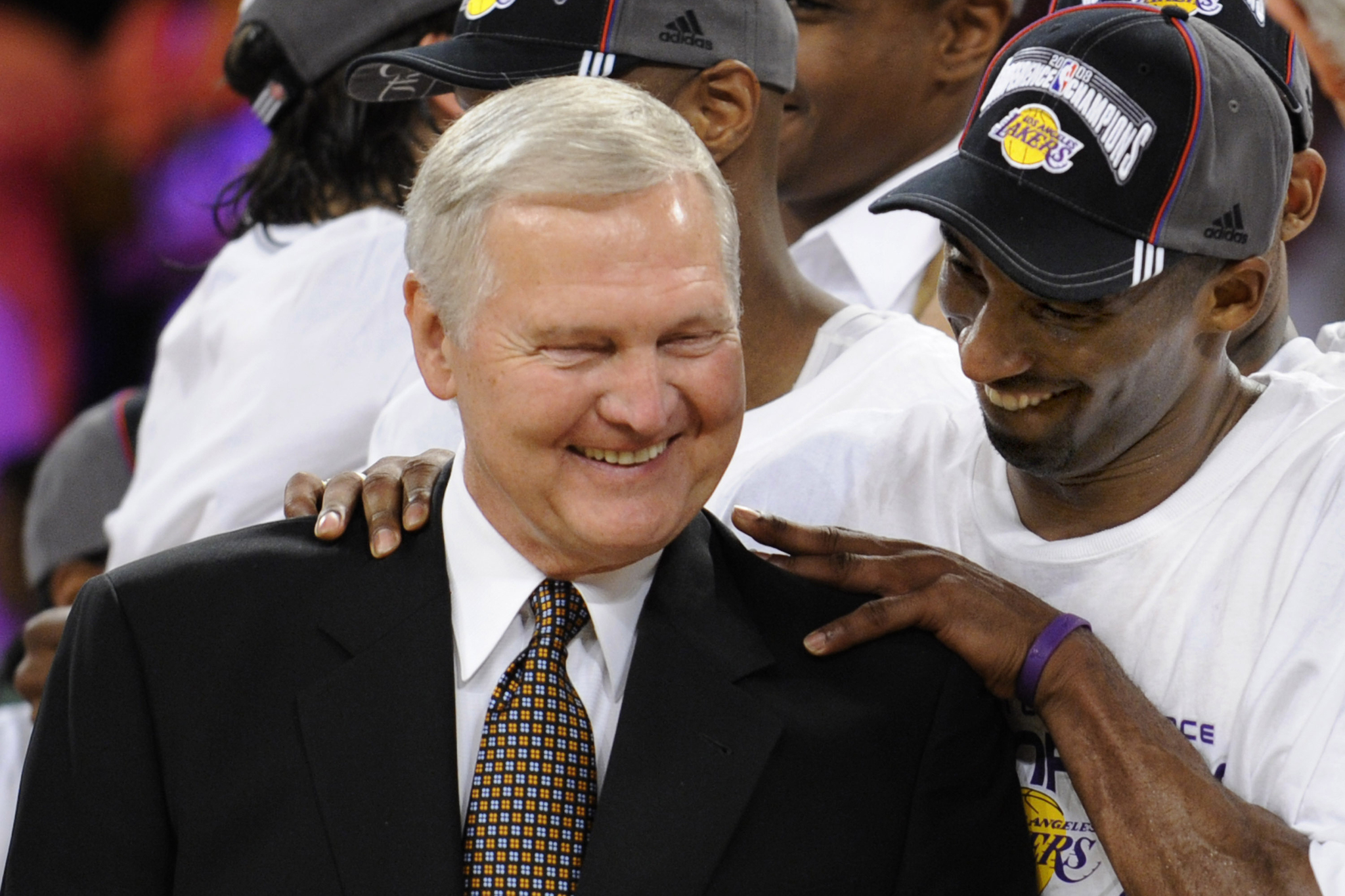 Los Angeles Lakers Kobe Bryant gives basketball great Jerry West a shoulder rub