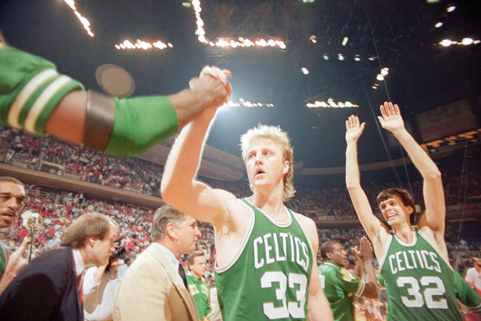 Larry Bird (33) and Kevin McHale celebrate the Boston Celtics title in 1986.