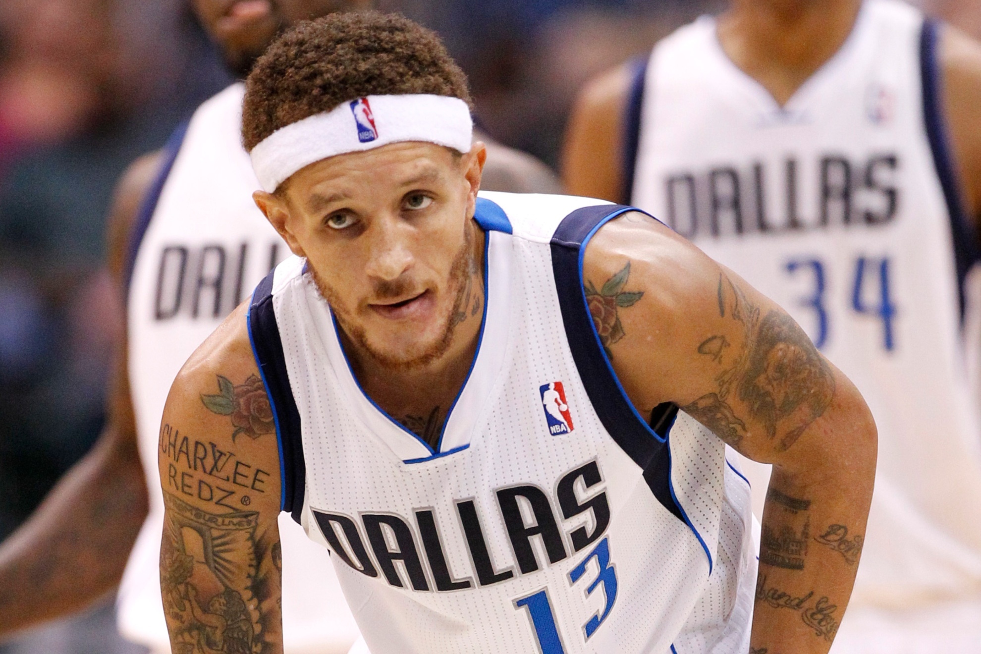 Dallas Mavericks guard Delonte West (13) during a break in play against the Phoenix Suns in an NBA basketball game Wednesday, Oct. 17, 2012, in Dallas. The Suns defeated the Mavericks 100-94. (AP Photo/Tony Gutierrez)