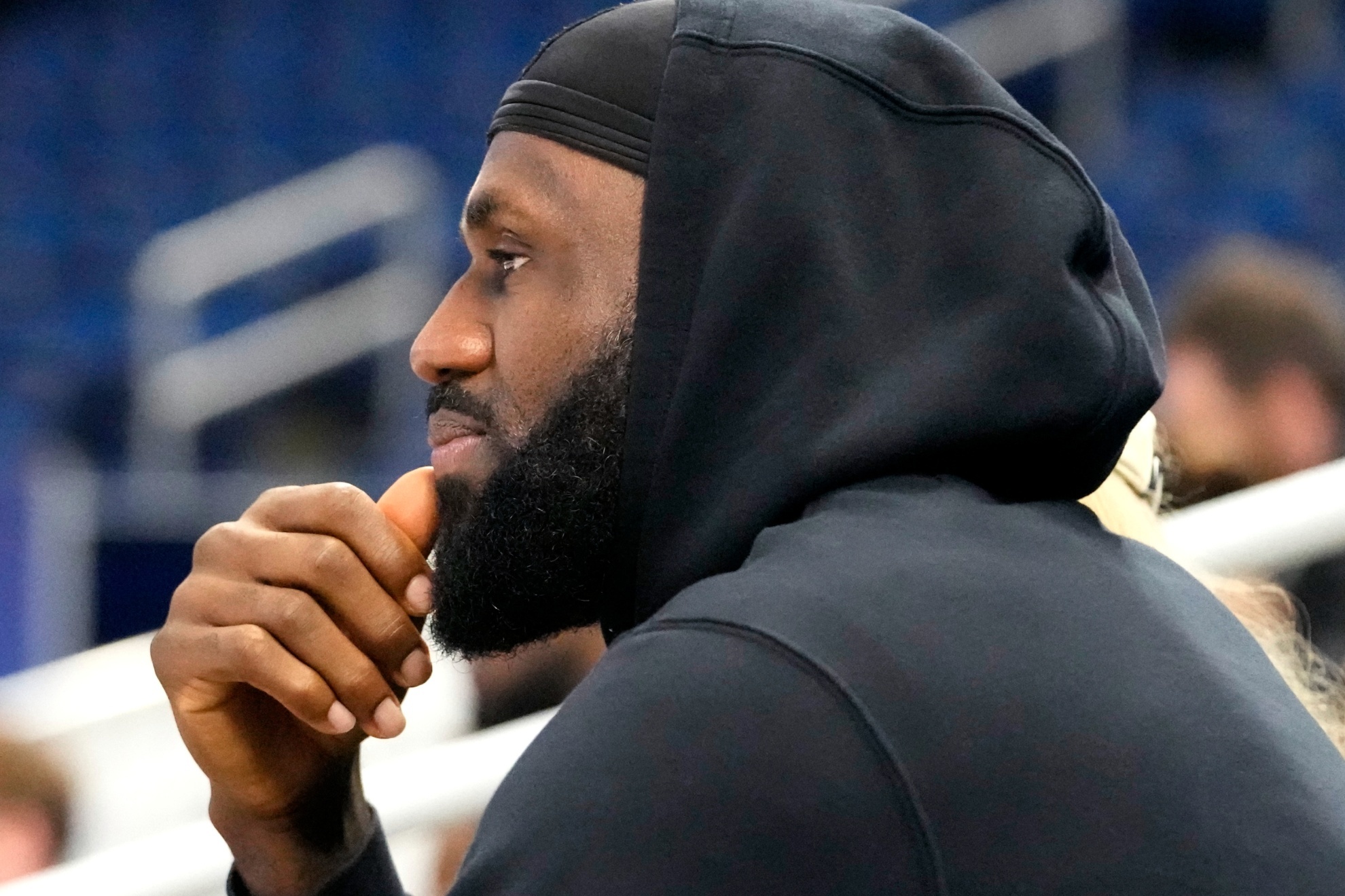 Los Angeles Lakers LeBron James watches his son Bronny James during the 2024 NBA Draft Combine 5-on-5 basketball game between TeamSt. Andrews and Team Love in Chicago, Wednesday, May 15, 2024. (AP Photo/Nam Y. Huh)