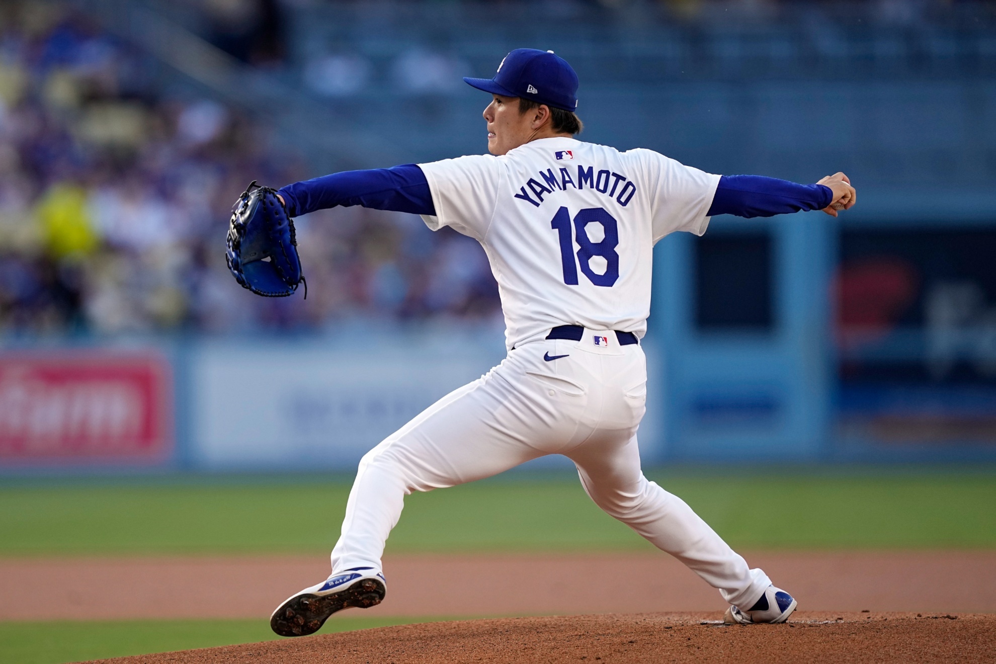 Los Angeles Dodgers starting pitcher Yoshinobu Yamamoto throws to the plate during the first inning of a baseball game against the Kansas City Royals Saturday, June 15, 2024, in Los Angeles. (AP Photo/Mark J. Terrill)