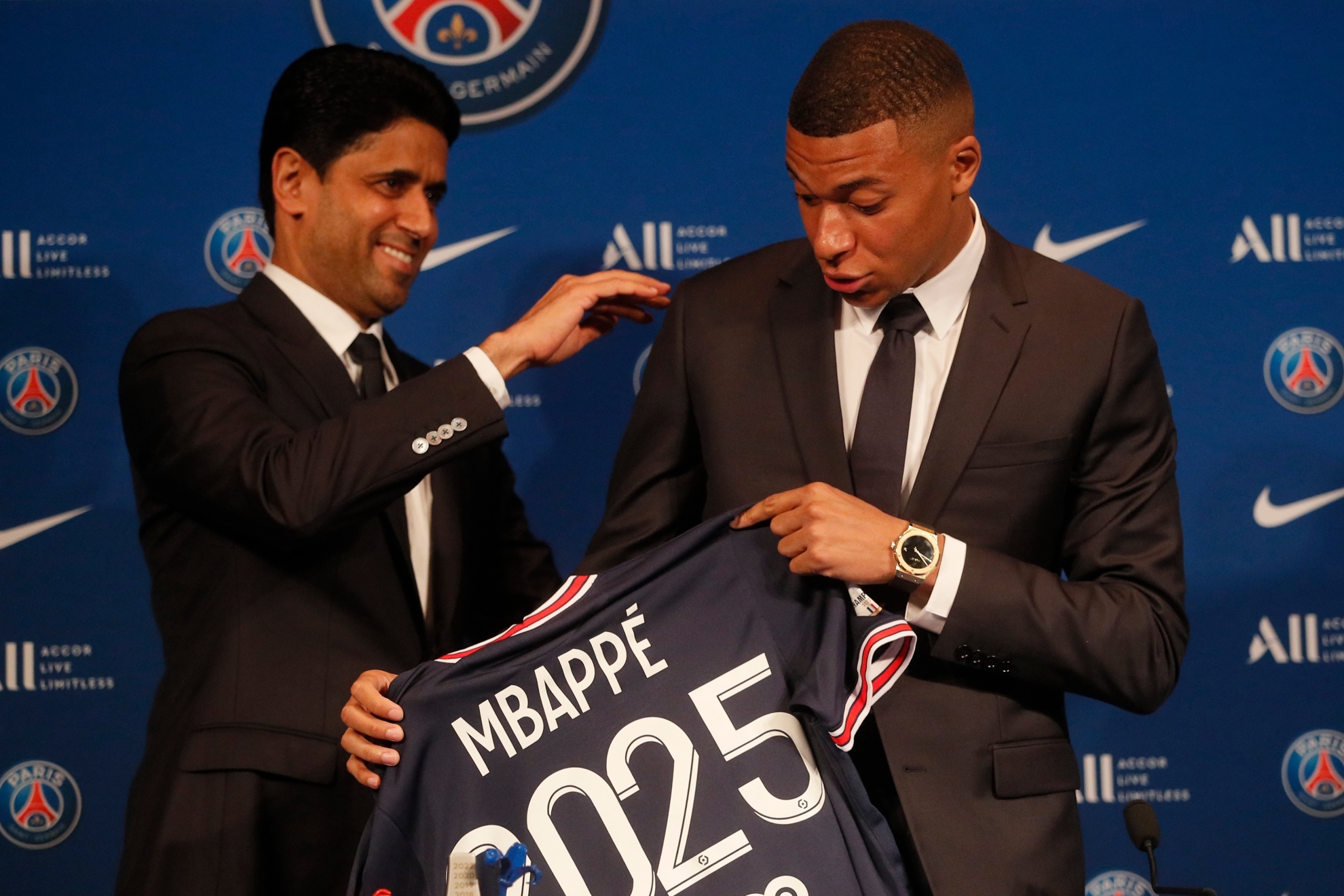 Kylian Mbappe and Al-Khelaifi at his contract renewal ceremony