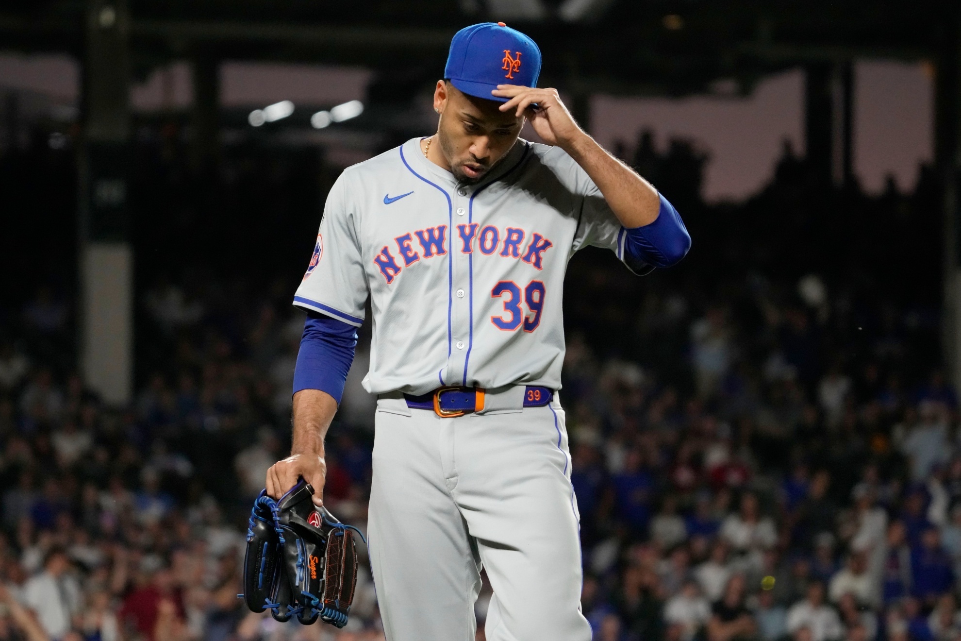 New York Mets relief pitcher Edwin D�az reacts after being ejected by their base umpire Vic Carapazza during the ninth inning of a baseball game against the Chicago Cubs in Chicago, Sunday, June 23, 2024. (AP Photo/Nam Y. Huh)