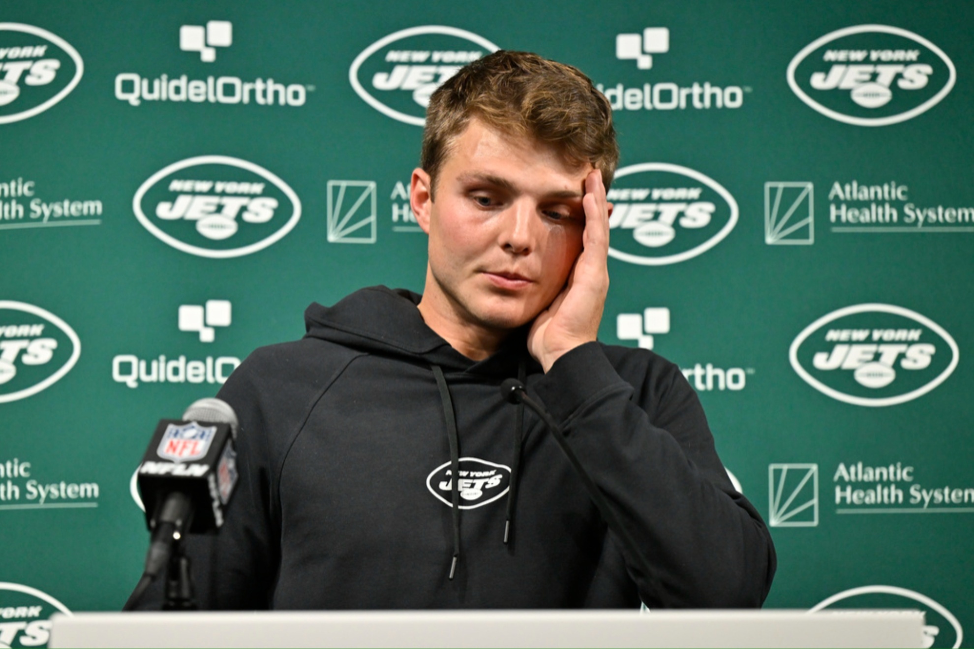 Zach Wilson with his old hairstyle at a press conference last November.