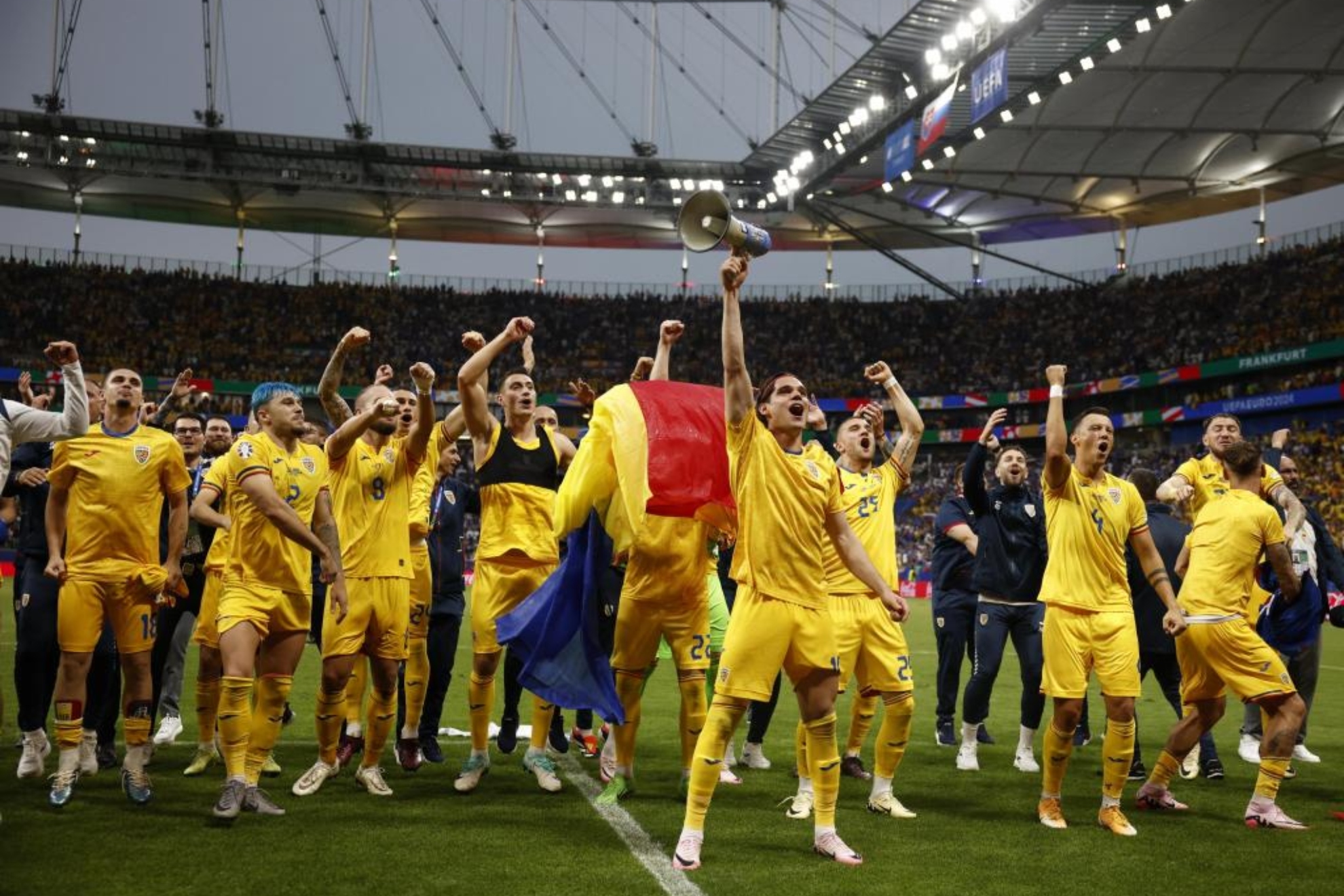 Players of Romania celebrate after the UEFA EURO 2024 group E soccer match between Slovakia and Romania