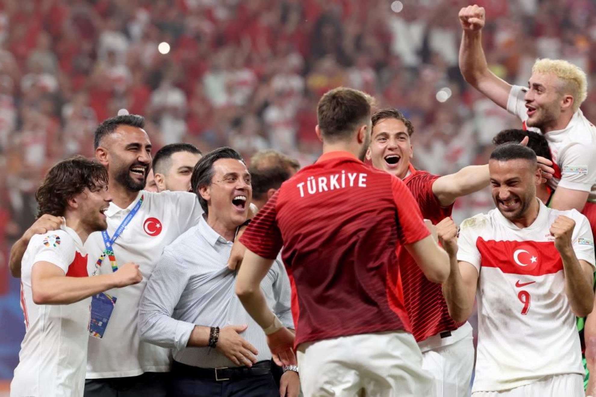 Italian head coach Vincenzo Montella (C) of Turkey and players celebrate after winning the UEFA EURO 2024  soccer match between Czech Republic and Turkey,