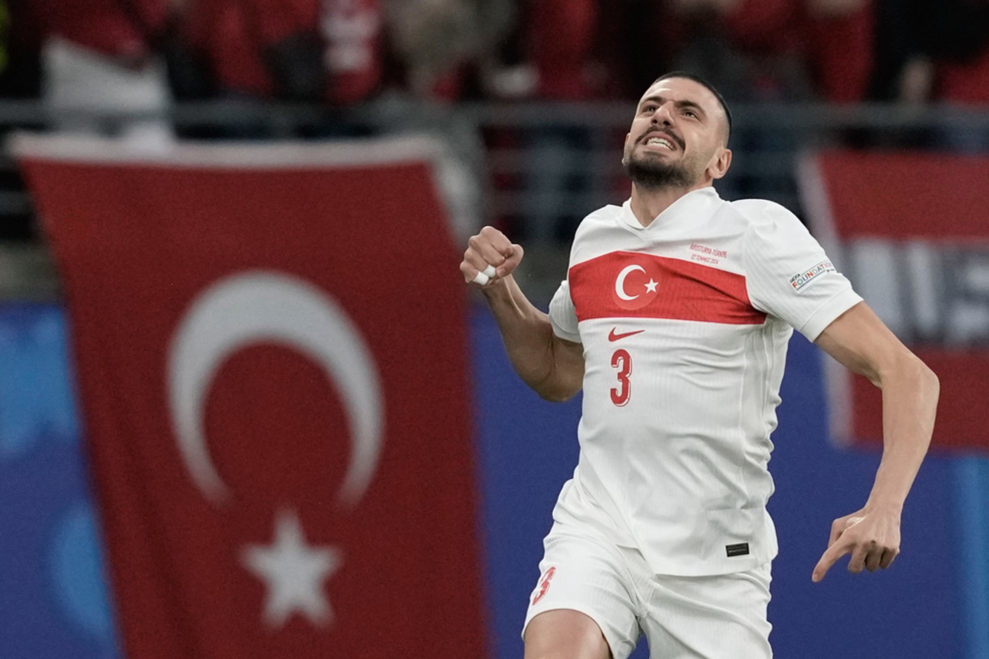 Merih Demiral celebrates scoring his sides opening goal against Austria /