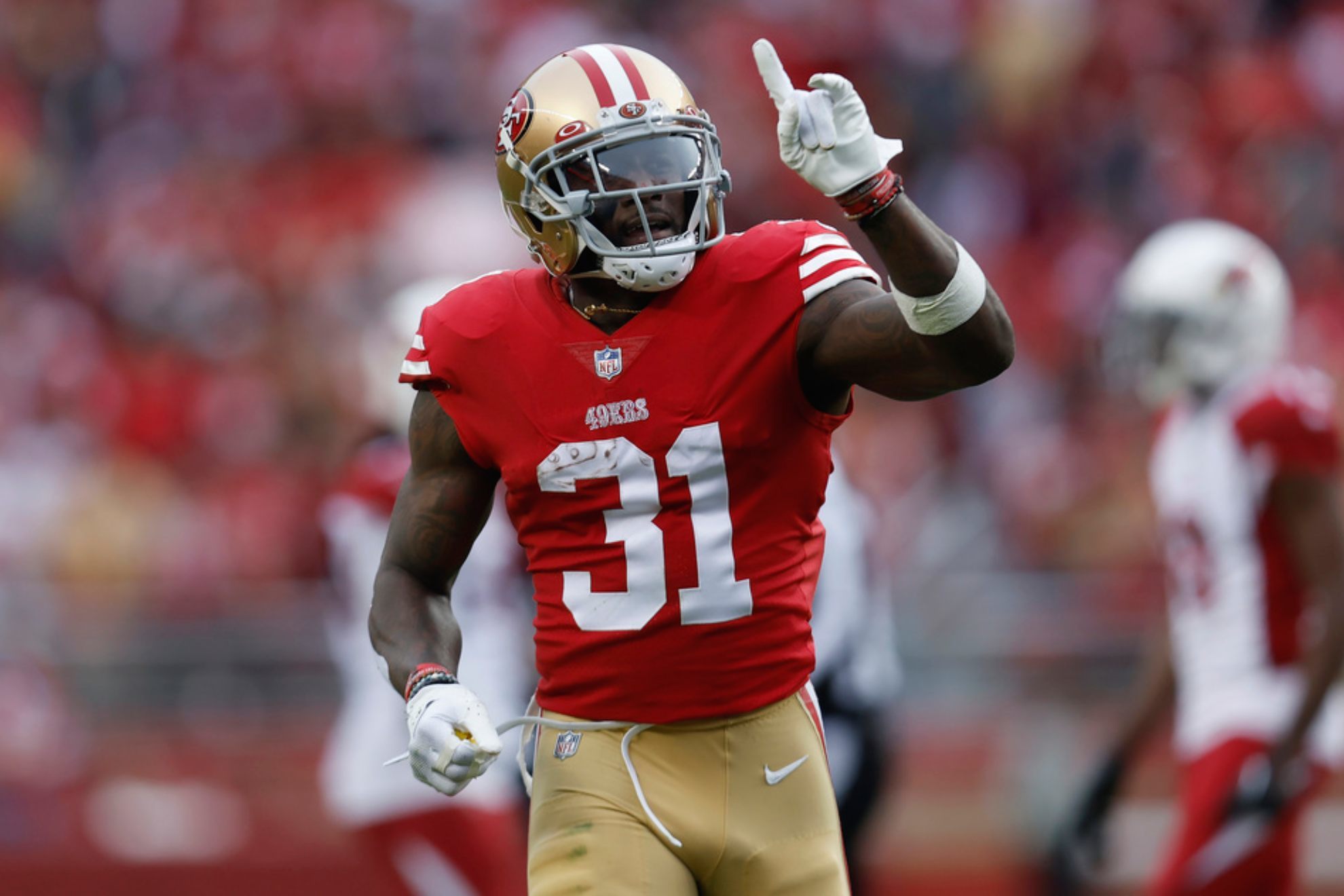 Tashaun Gipson Sr. (31) reacts after intercepting a pass against the Arizona Cardinals /