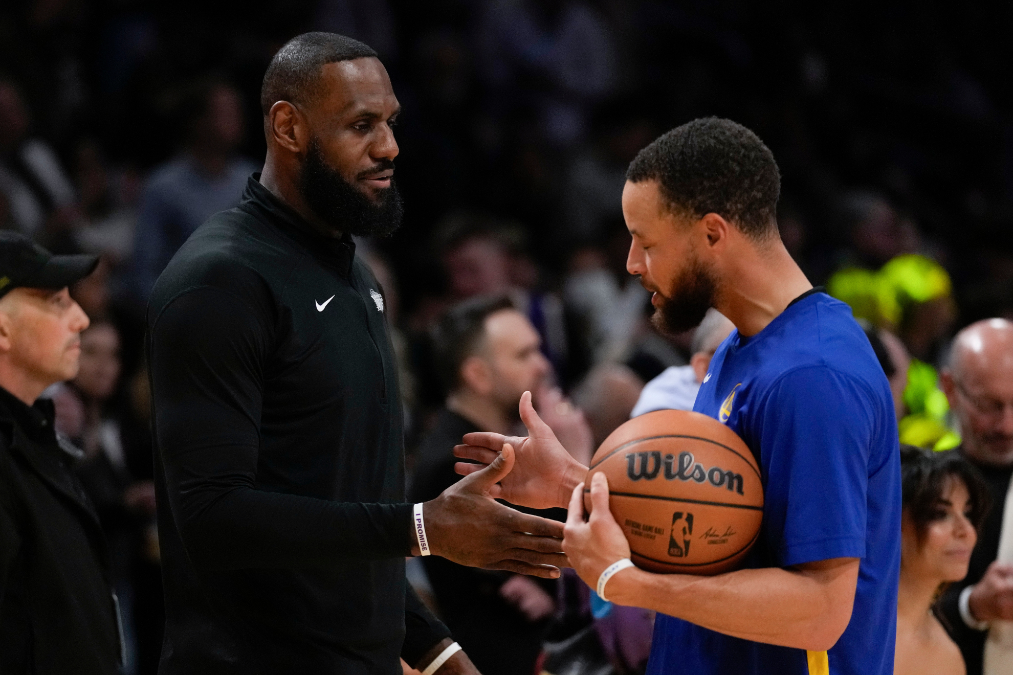 LeBron James (left) and Stephen Curry (right).