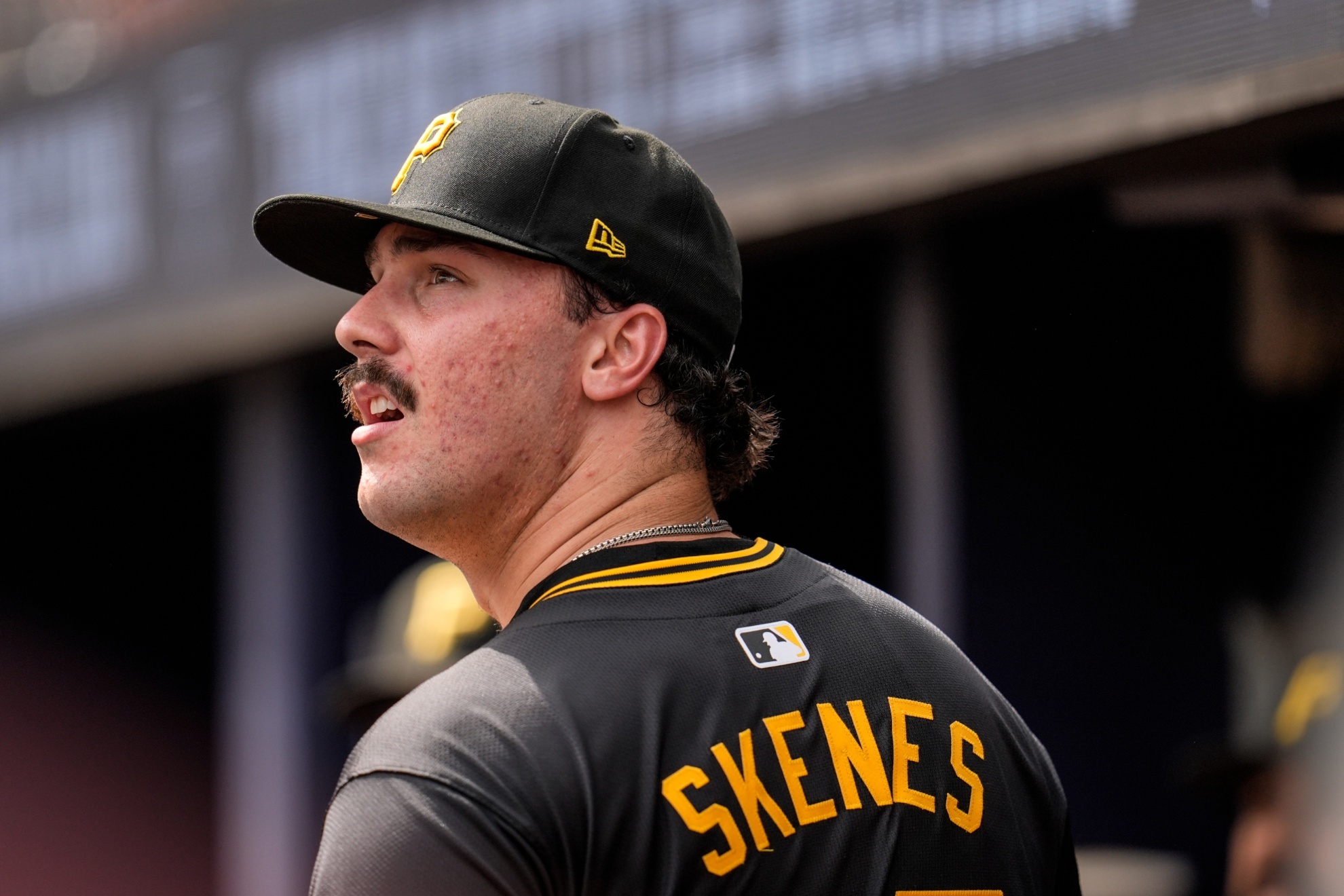 Pittsburgh Pirates pitcher Paul Skenes (30) walks in the dugout in the third inning of a baseball game against the Atlanta Braves, Saturday, June 29, 2024, in Atlanta. (AP Photo/Mike Stewart)