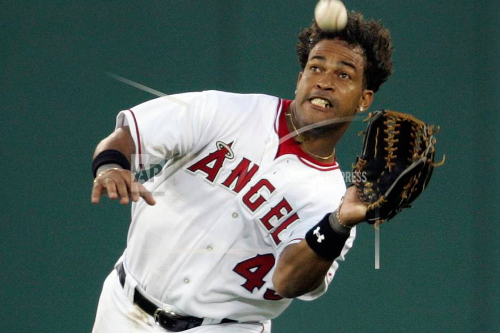 Anaheim Angels center fielder Raul Mondesi catches a ball hit by Boston Red Soxs Kevin Youkilis in the second inning at Angel Stadium in Anaheim, Calif.