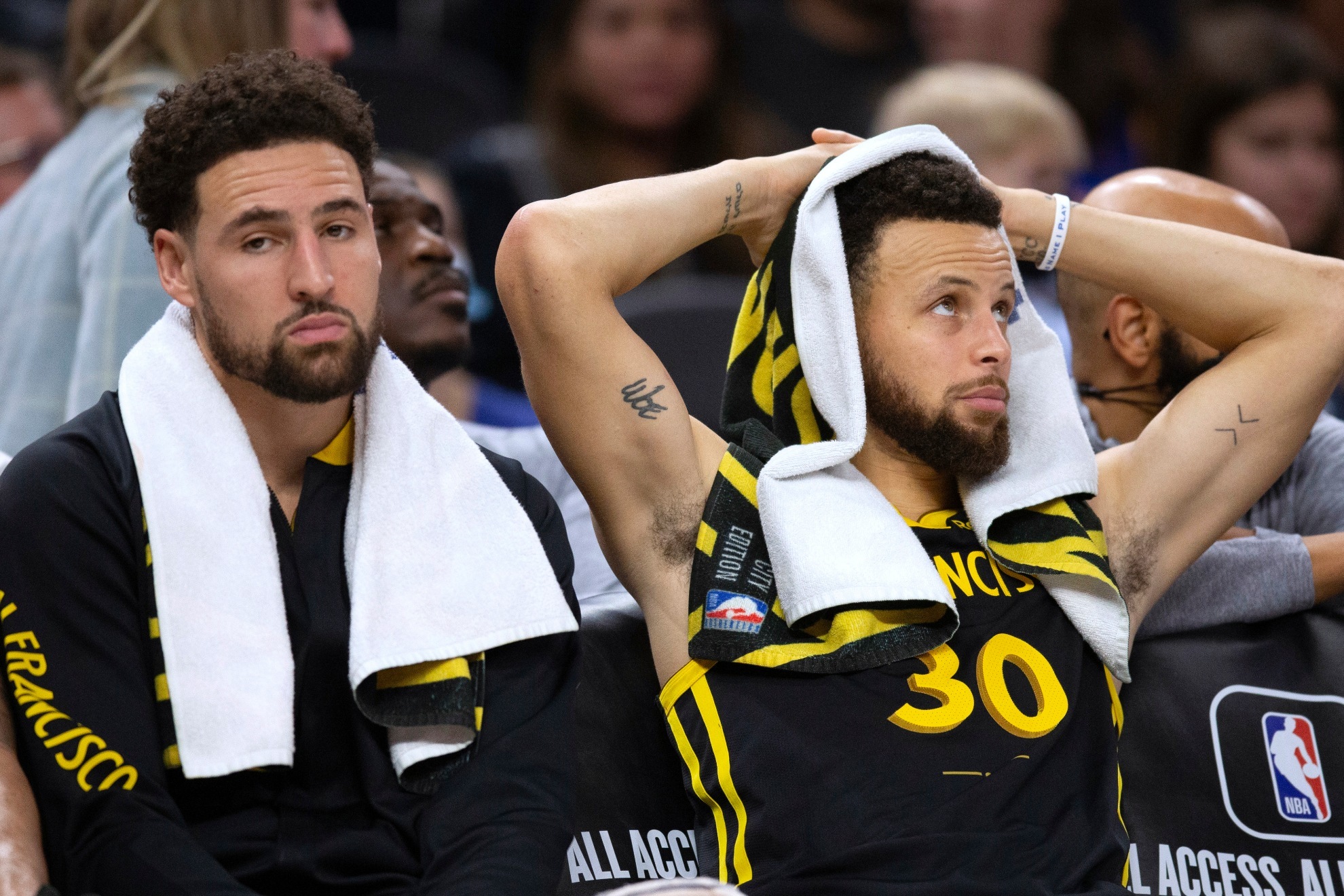 Klay Thompson and Stephen Curry at a Warriors game