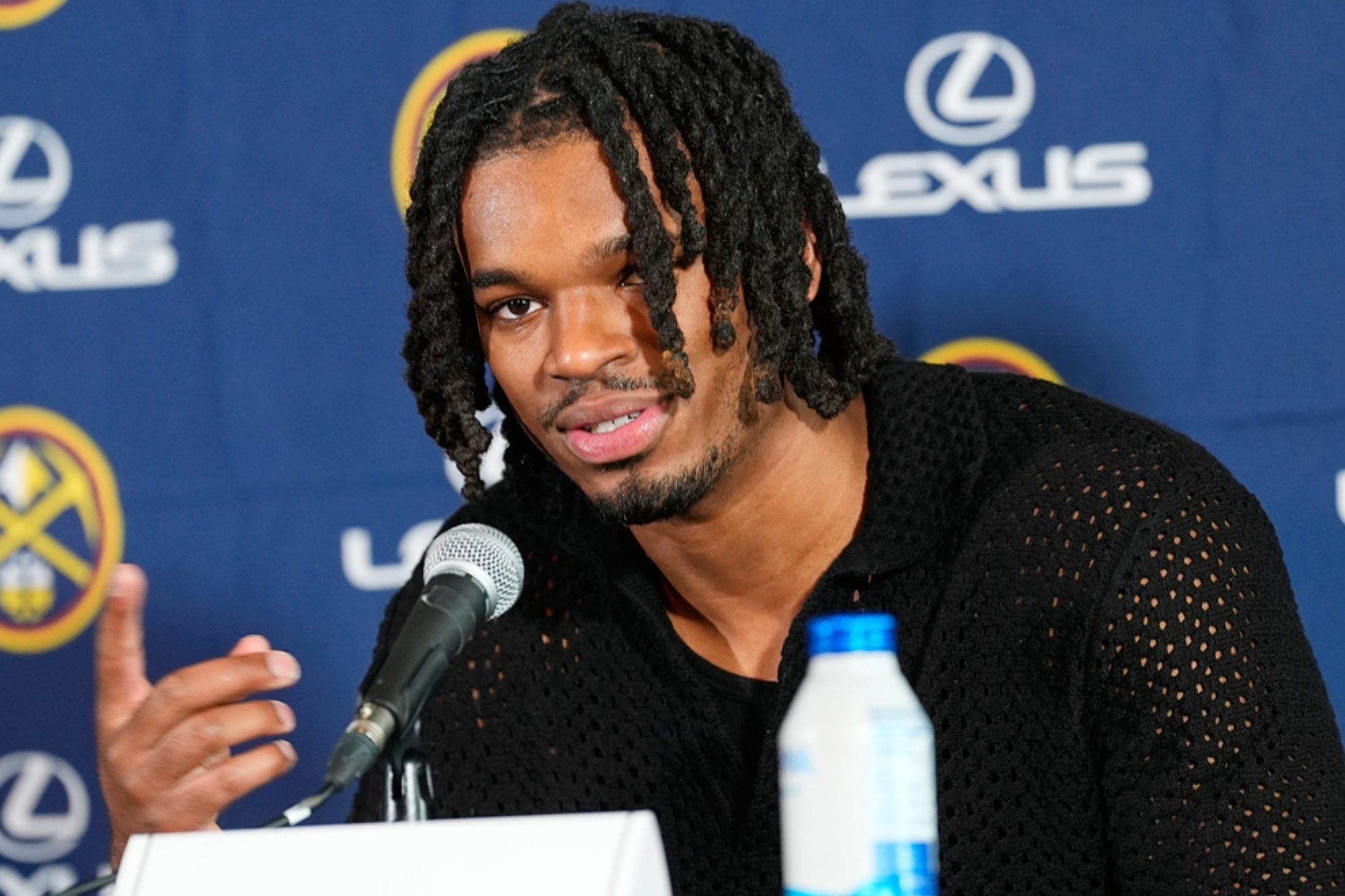 Denver Nuggets 2024 first-round draft pick DeRon Holmes II speaks during an NBA basketball news conference /