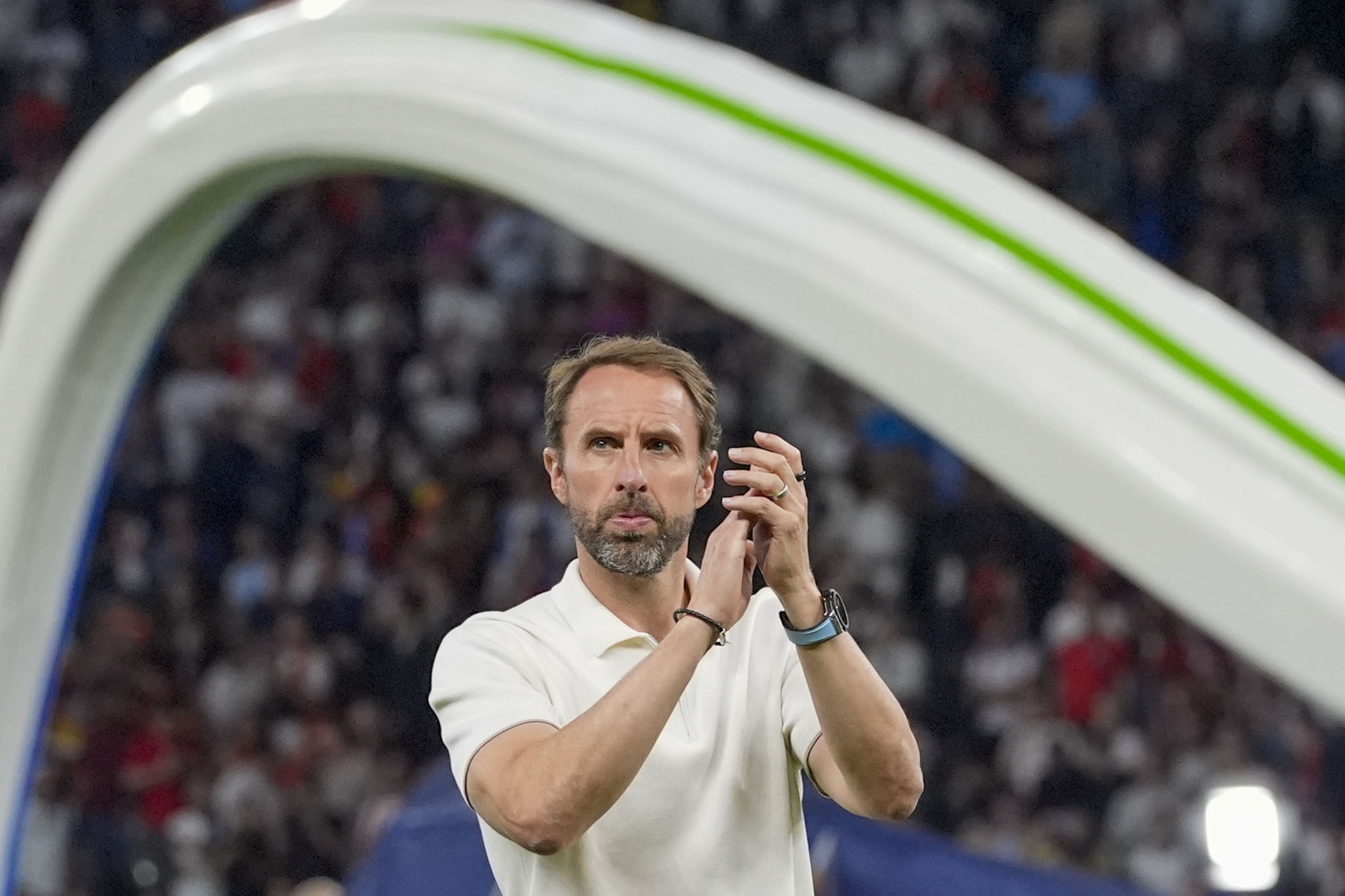 Englands manager Gareth Southgate applauds to supporters at the end of the final match between Spain and England.