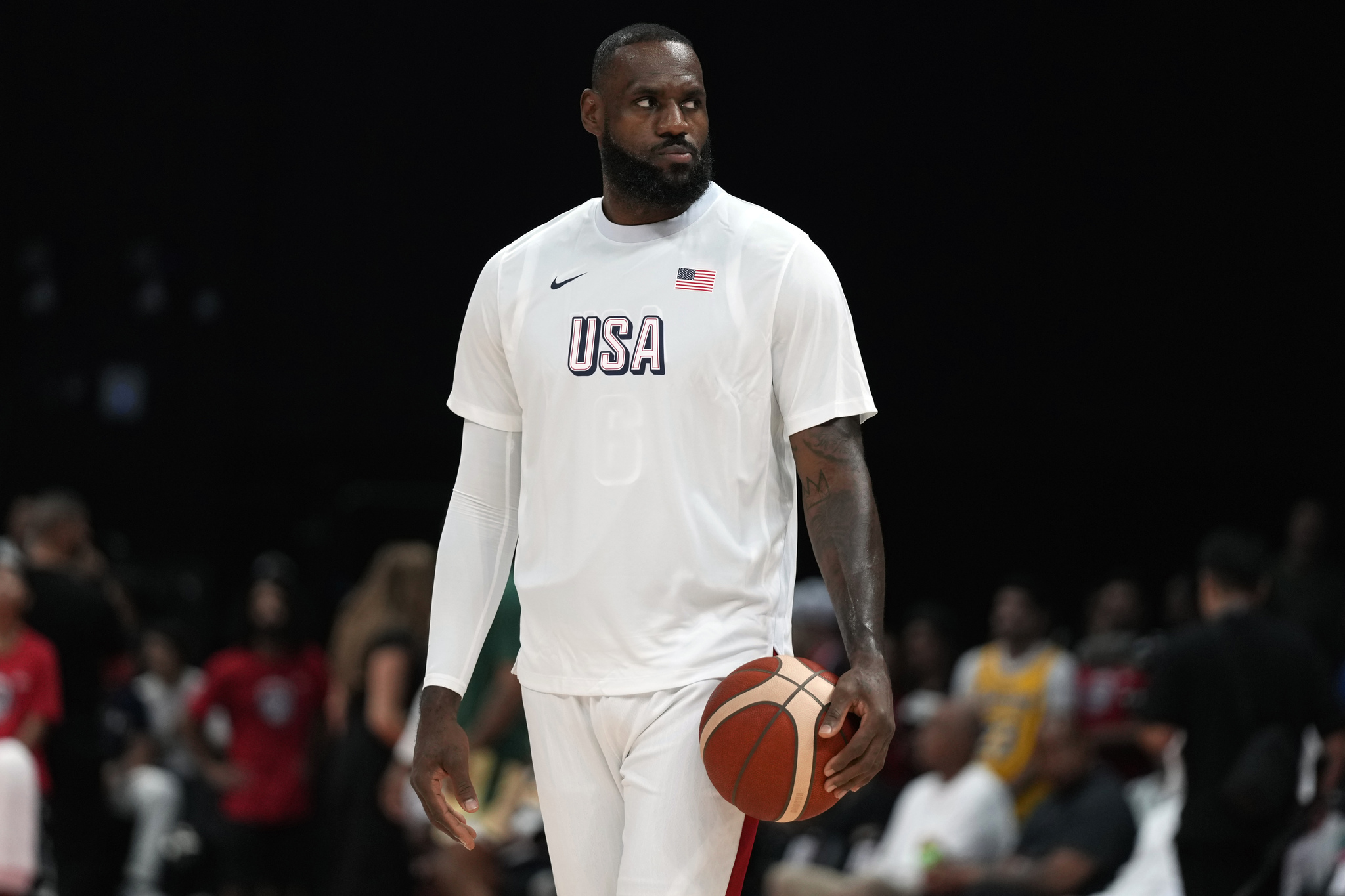 LeBron James looks on before USAs match against Australia