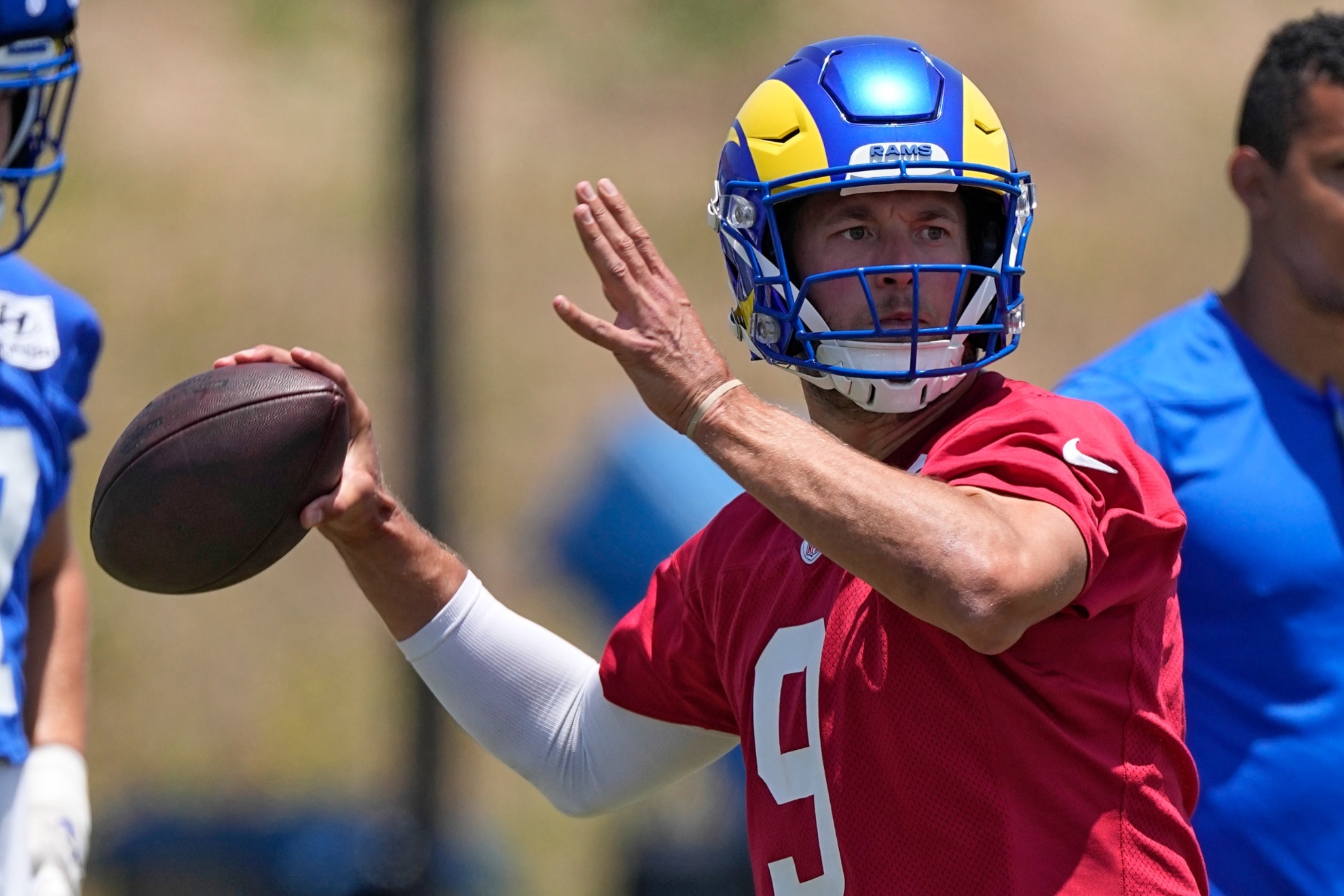 Los Angeles Rams quarterback Matthew Stafford passes during an NFL football practice Tuesday, June 4, 2024, in Thousand Oaks, Calif. (AP Photo/Mark J. Terrill)