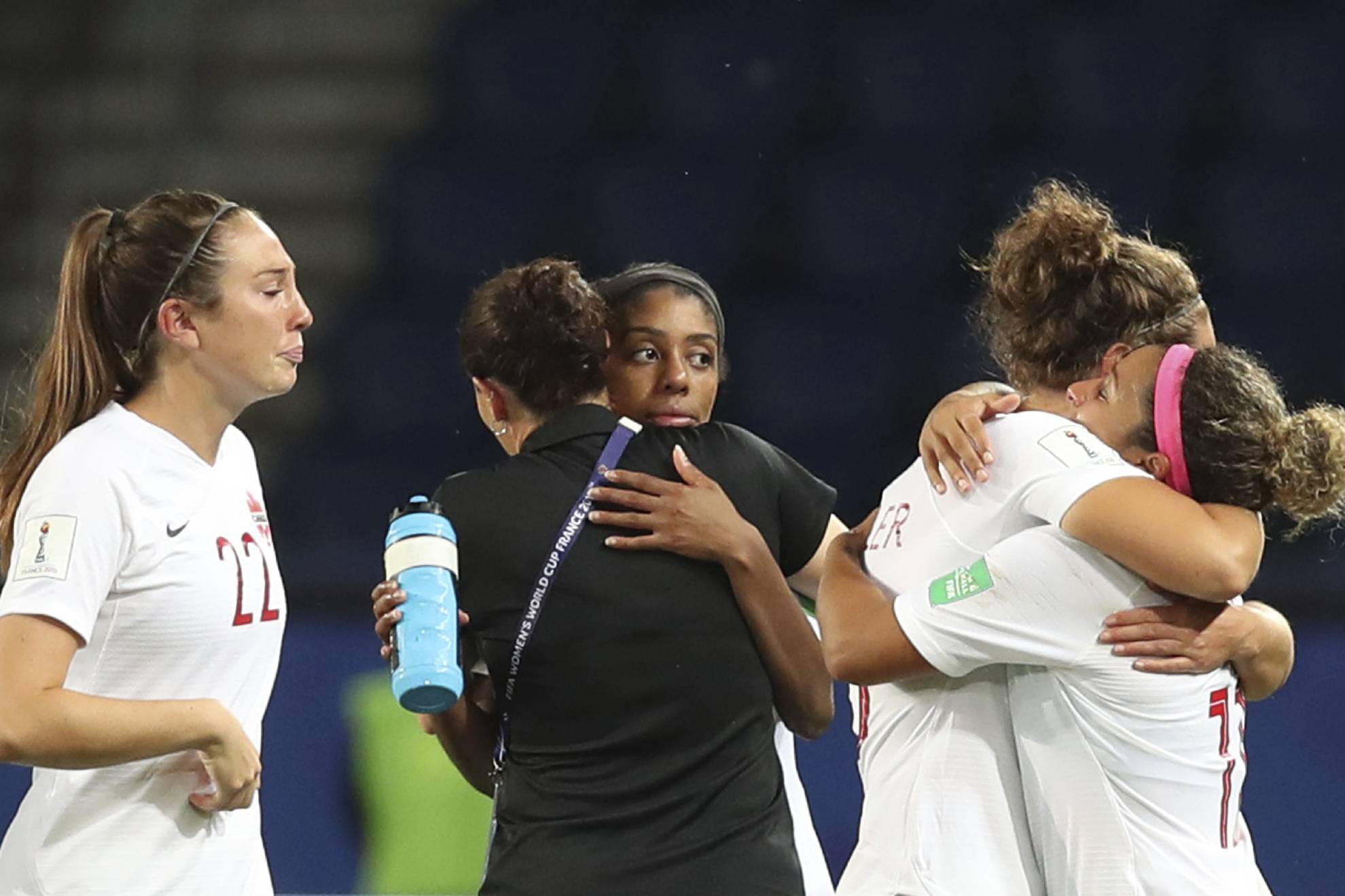 Team Canada reacts after they lost their Womens World Cup round of 16 soccer match between Canada and Sweden at Parc des Princes in Paris, France, Monday, June 24, 2019.