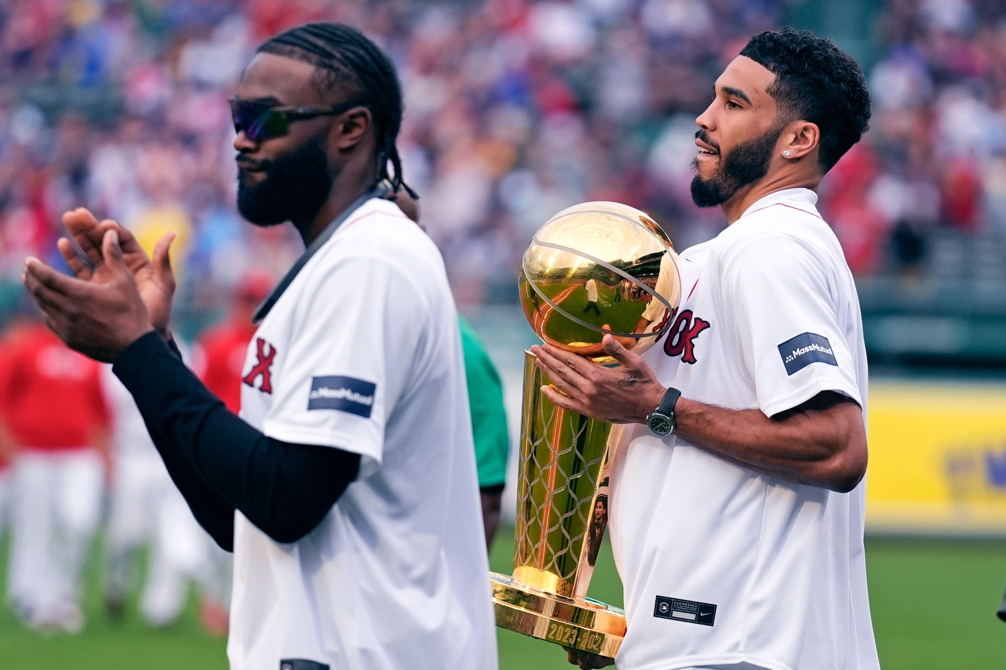 Jaylen Brown and Jayson Tatum celebrate the NBA Championship